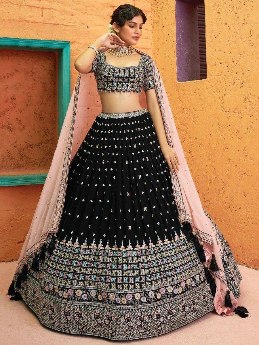 Black embroidered lehenga choli with pink dupatta, ethnic Indian wear for weddings and festivals