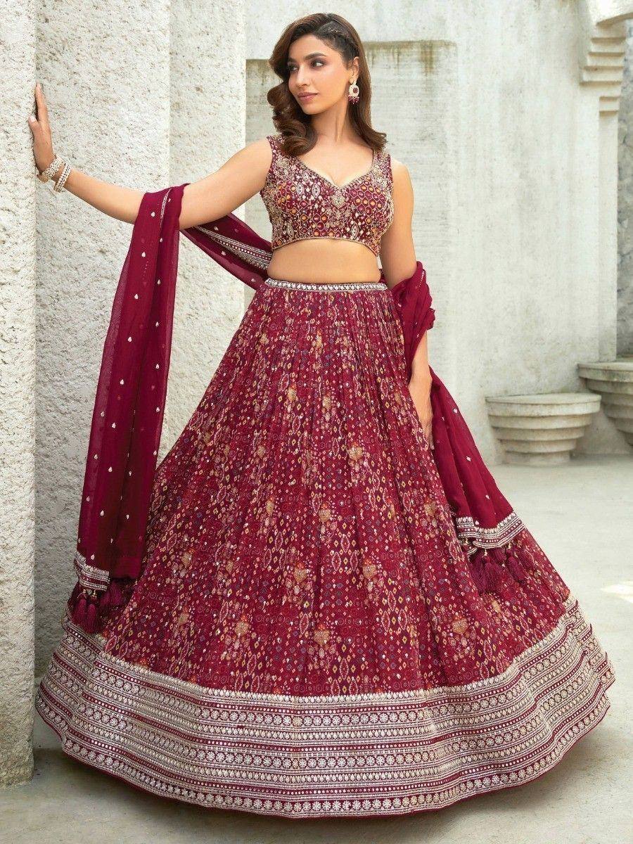 Maroon embroidered lehenga choli with dupatta, perfect for Indian weddings and festive occasions