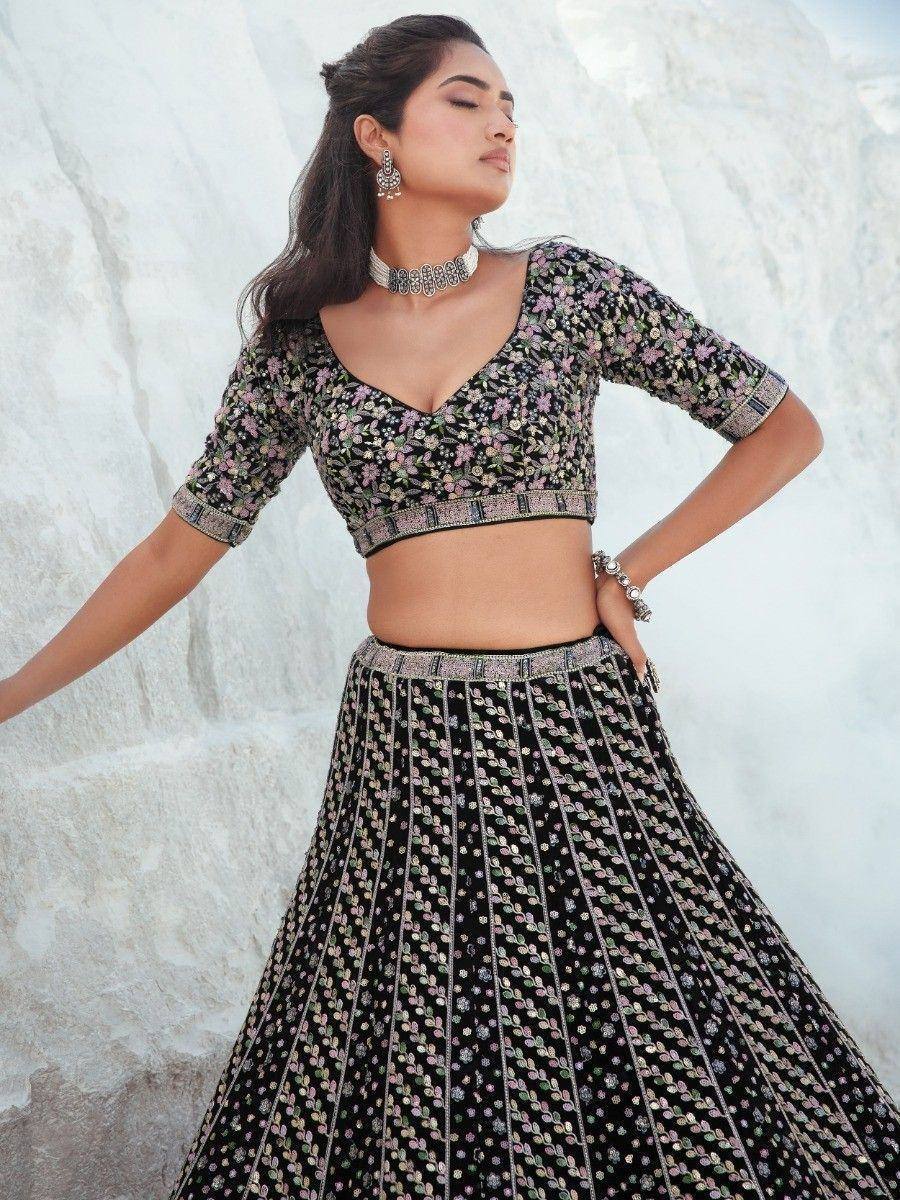 Black floral embroidered lehenga choli with V-neck blouse, perfect for Indian ethnic occasions