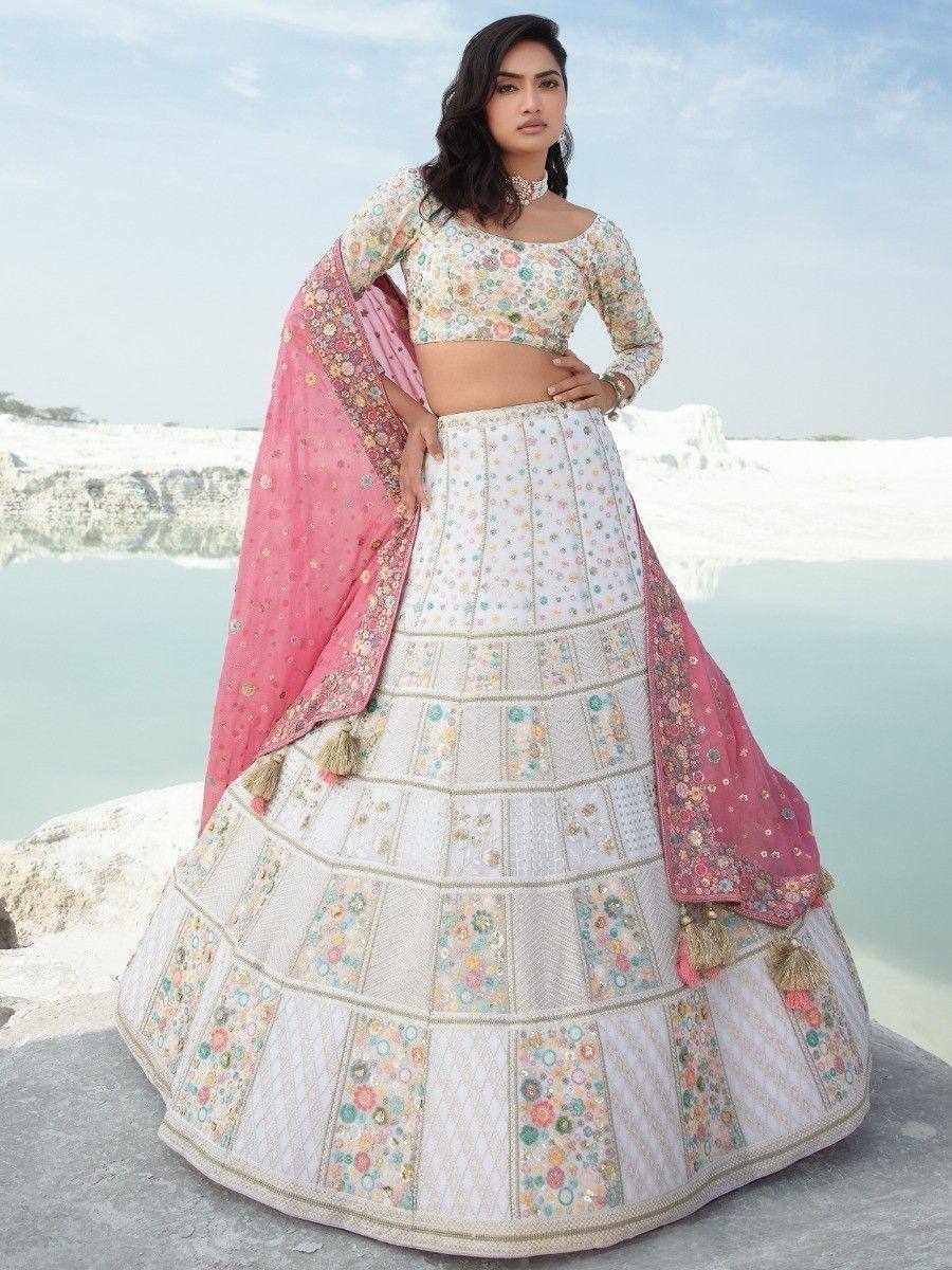 Floral embroidered lehenga choli with pink dupatta, perfect for Indian weddings and festive occasions