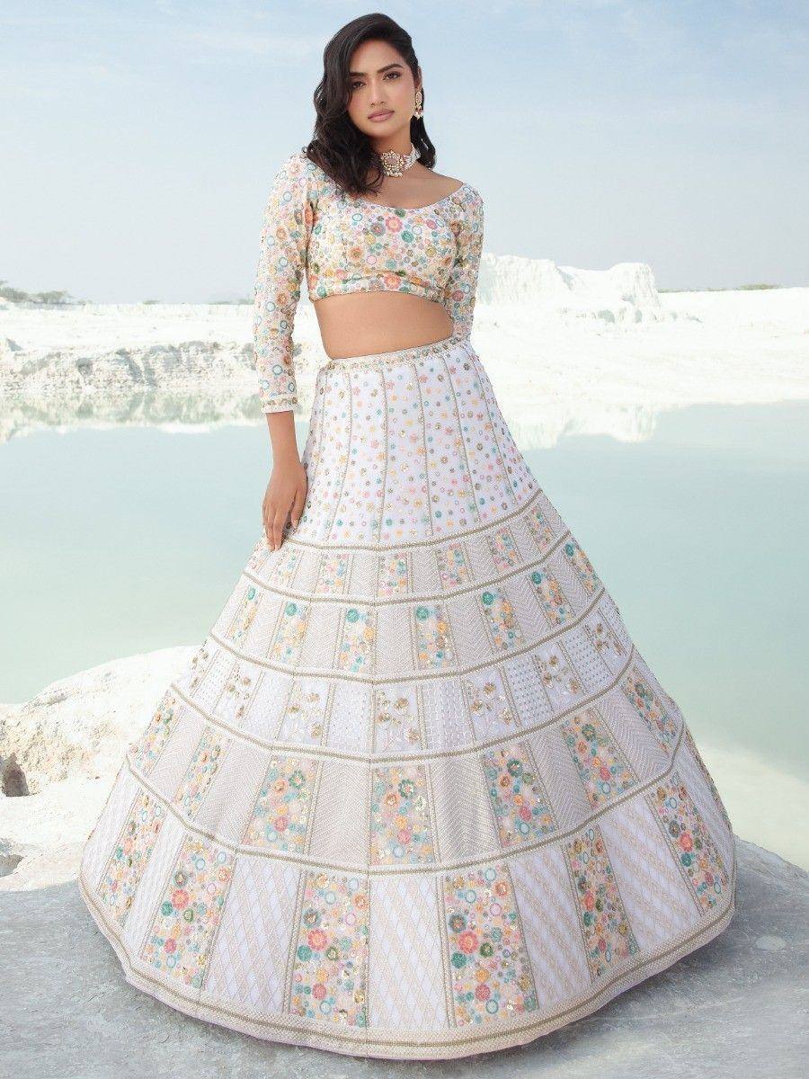 Floral embroidered lehenga choli with tiered skirt, perfect for Indian ethnic occasions