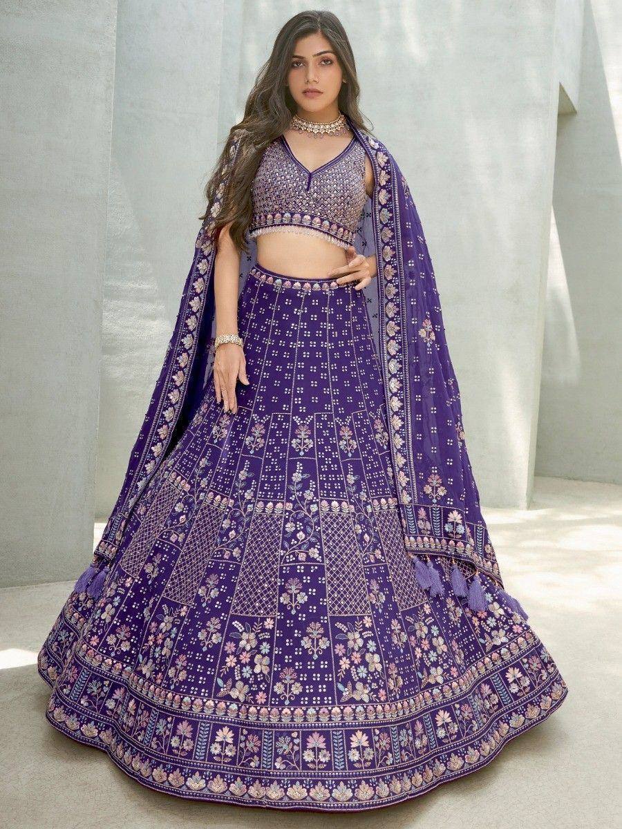 Purple embroidered lehenga choli with floral patterns and dupatta, perfect for Indian ethnic occasions