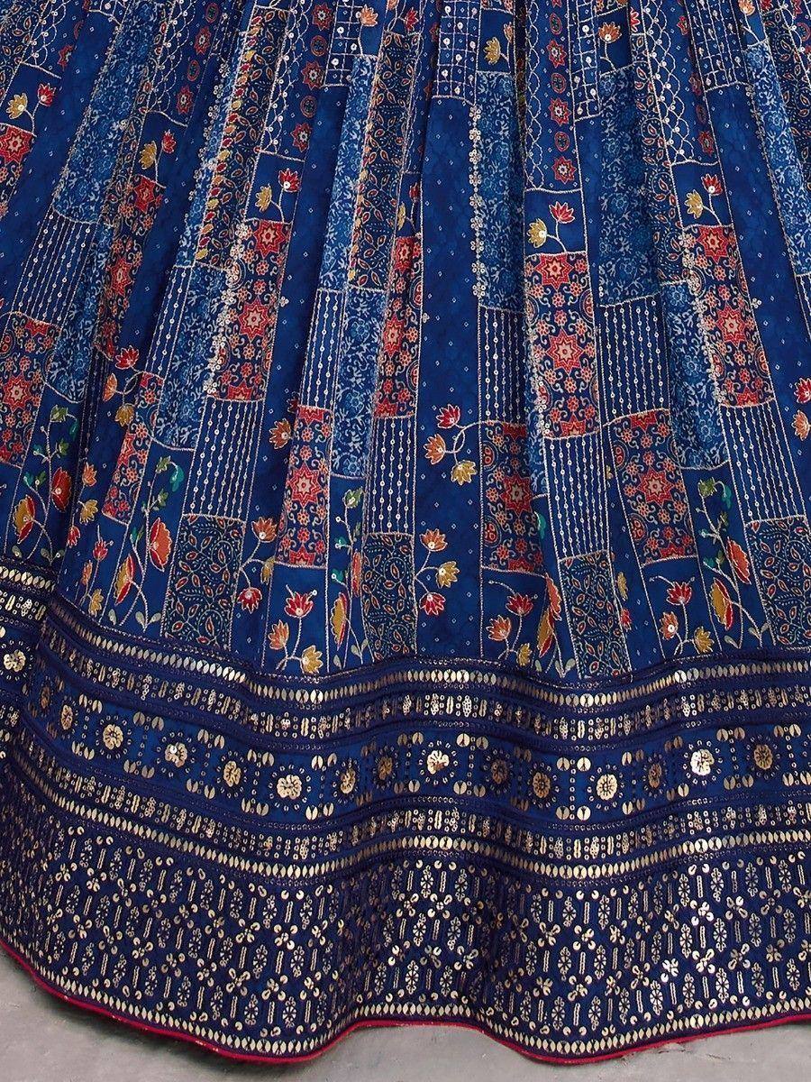 Blue embroidered lehenga skirt with floral patchwork and gold detailing, ethnic Indian wear