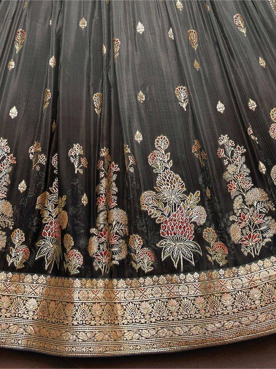 Black lehenga with gold and red floral embroidery and intricate border detail