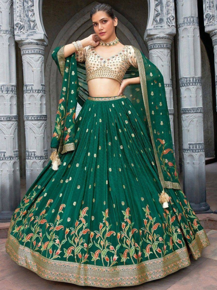 Emerald green designer lehenga choli with floral embroidery, perfect for Indian weddings and festive occasions