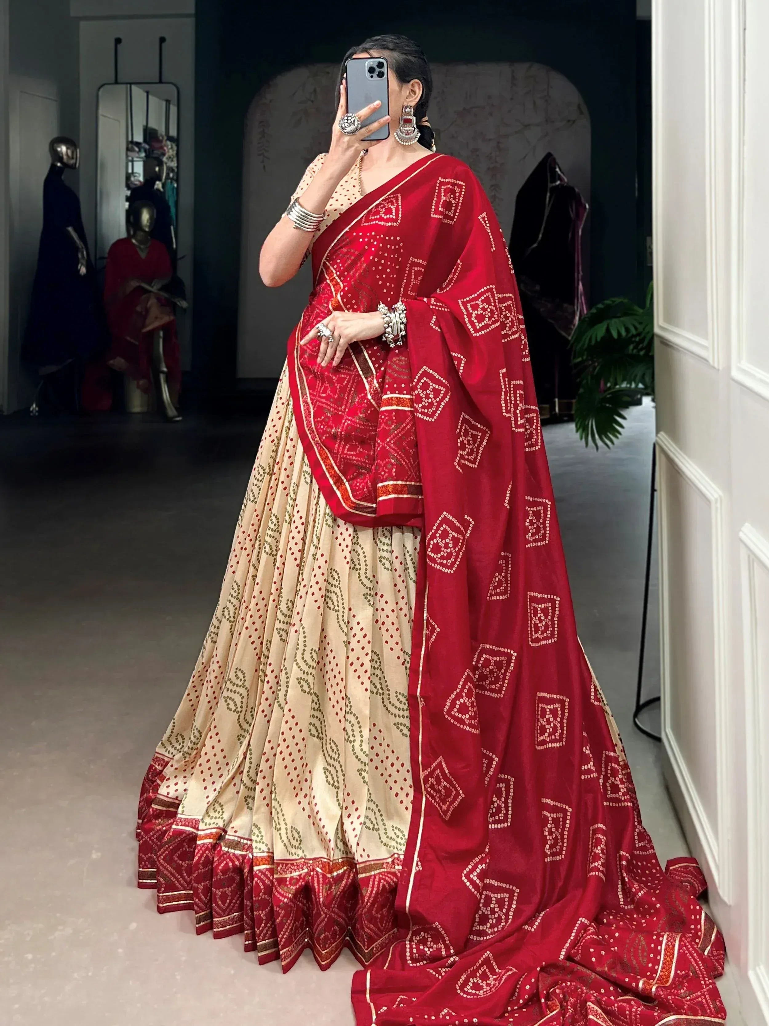 Red and beige embroidered lehenga choli with geometric patterns, perfect for Indian ethnic wear occasions