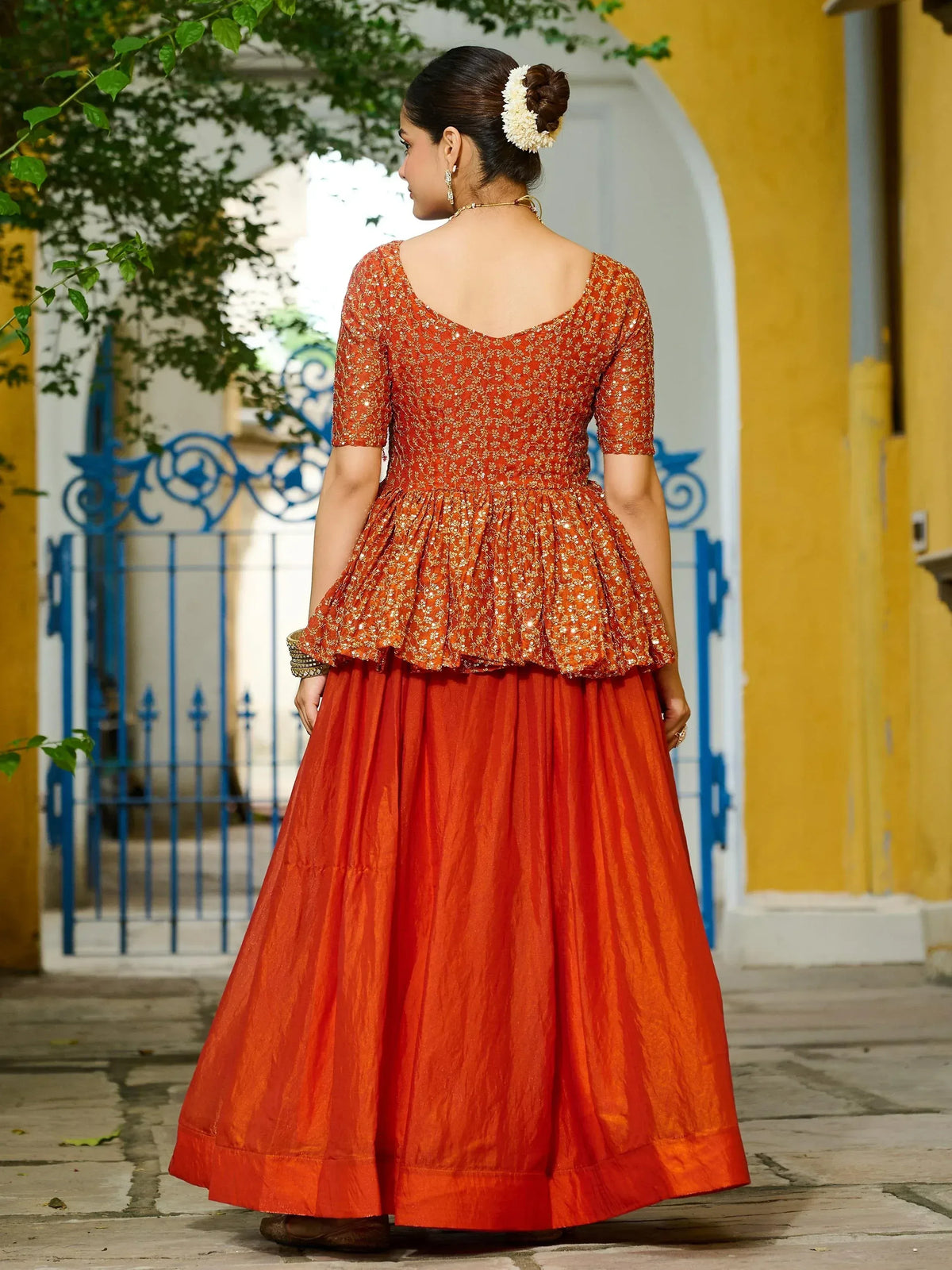 Orange floral embroidered peplum top with matching lehenga, Indian ethnic wear for women