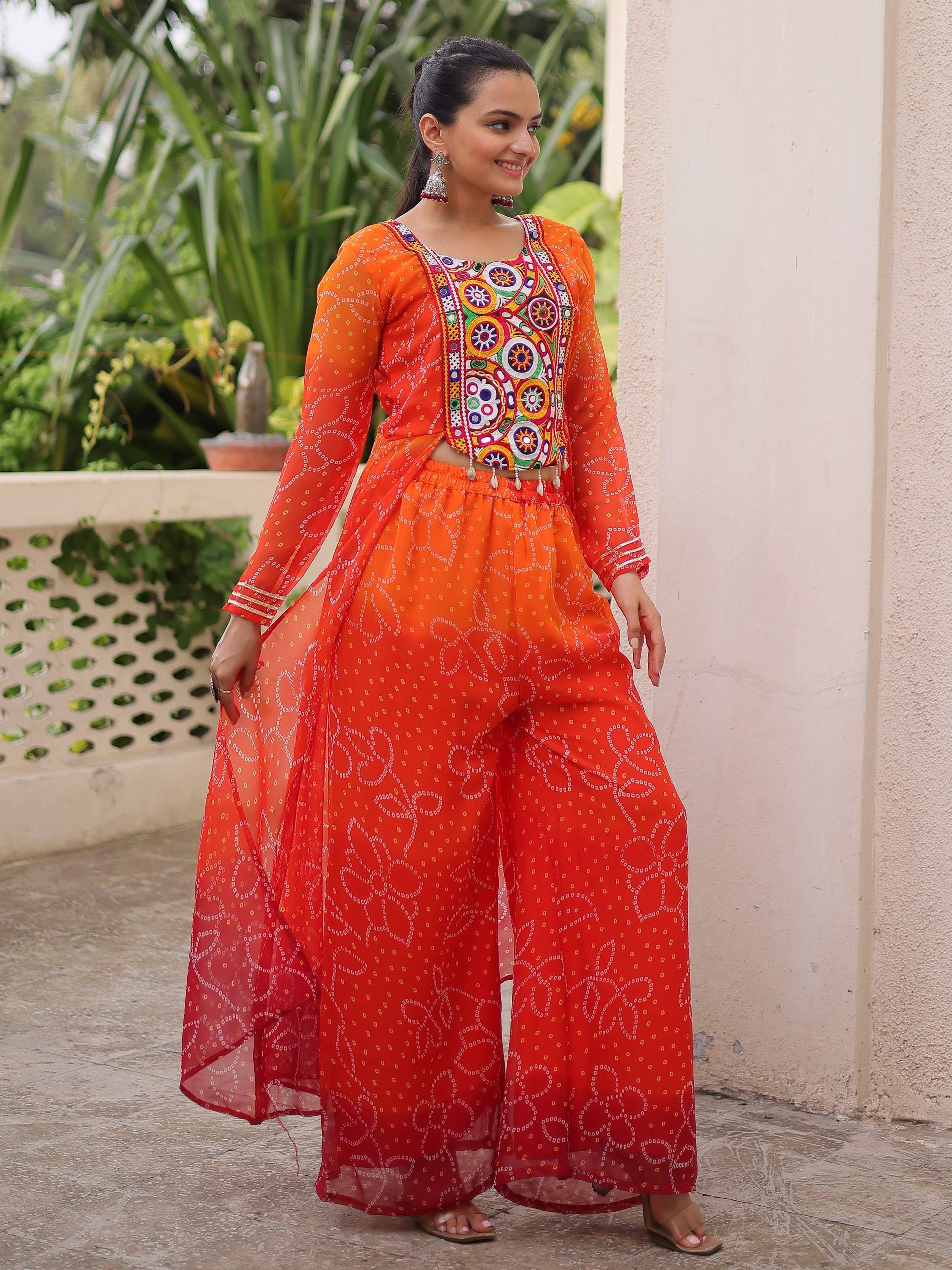 Vibrant orange ethnic wear with mirror work, bandhani print, and palazzo pants for women
