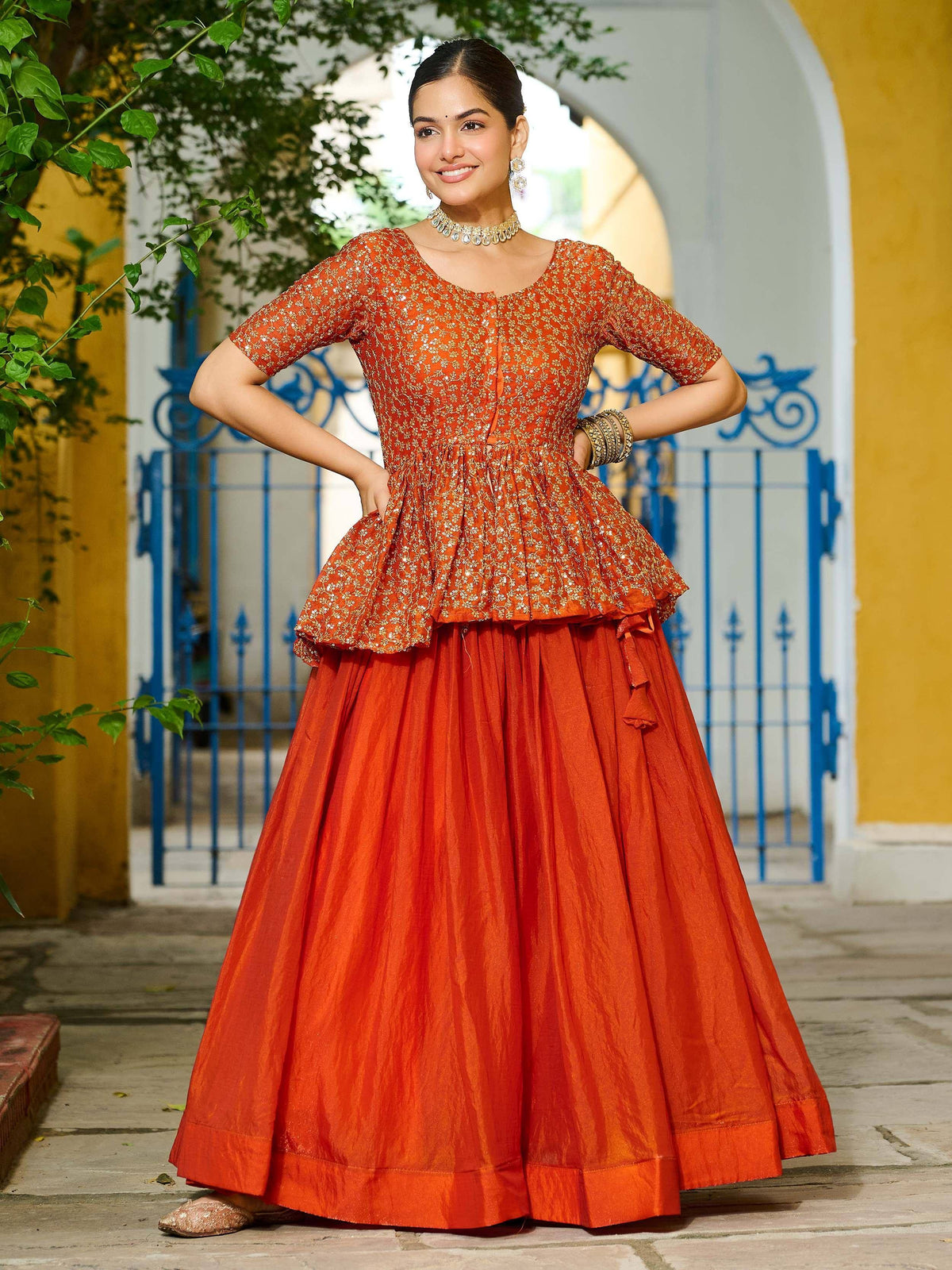 Orange embroidered peplum top with flared skirt, Indian ethnic wear for women
