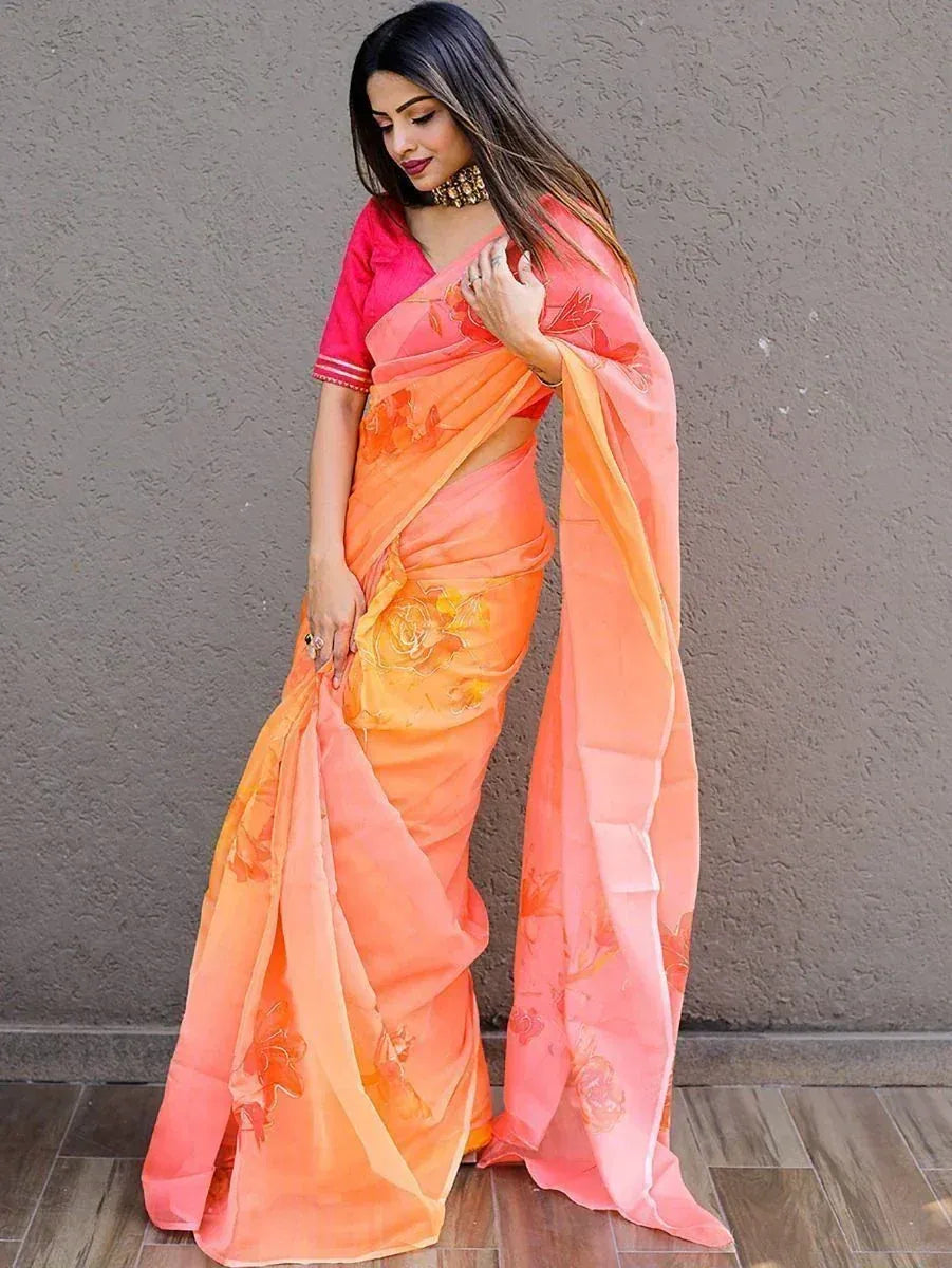 Orange floral printed saree with pink blouse, ethnic Indian wear for women