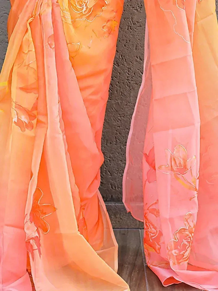 Orange and pink floral embroidered saree with sheer dupatta, perfect for ethnic occasions
