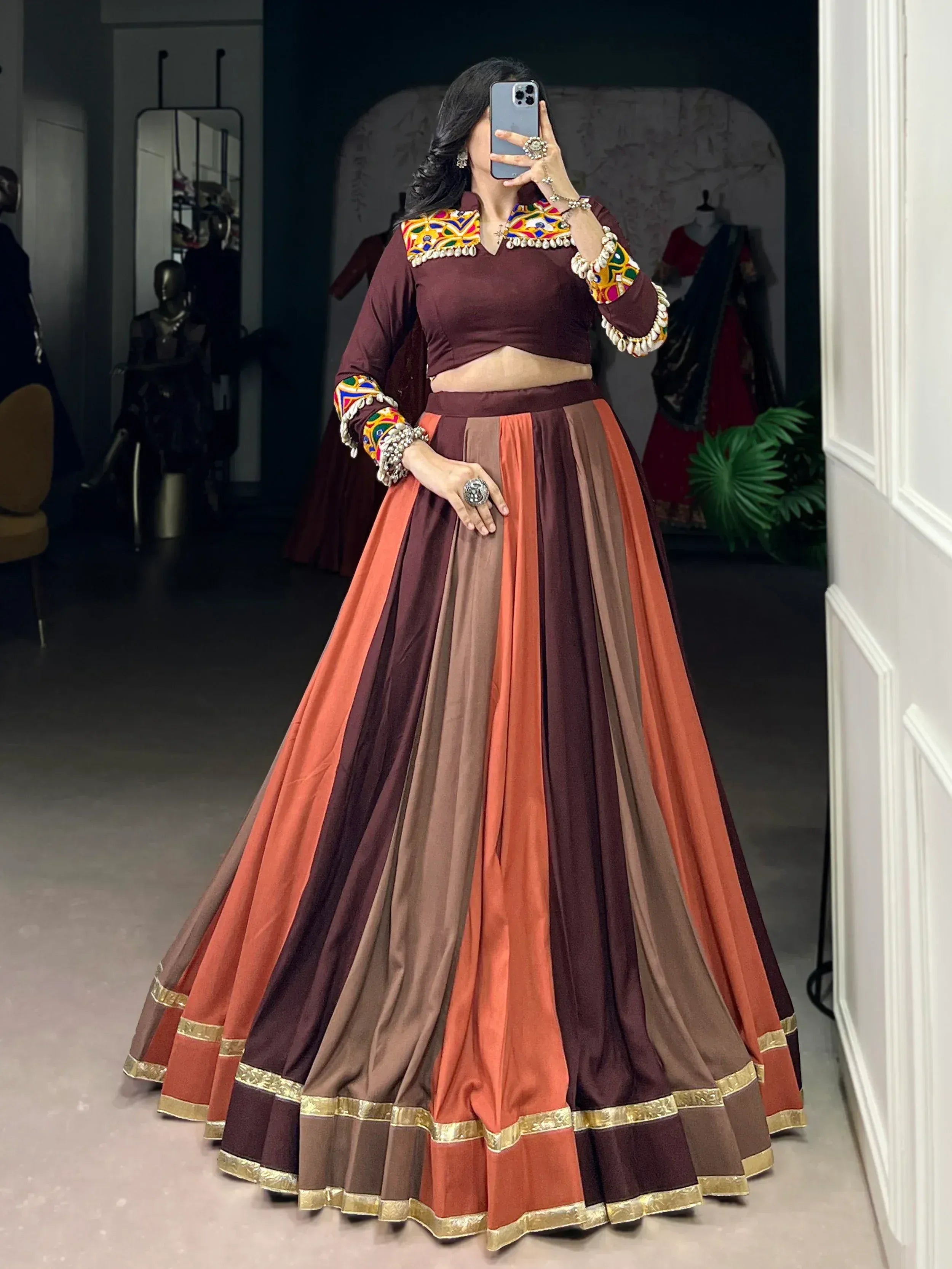 Maroon and orange embroidered lehenga choli with mirror work, perfect for Indian ethnic wear occasions