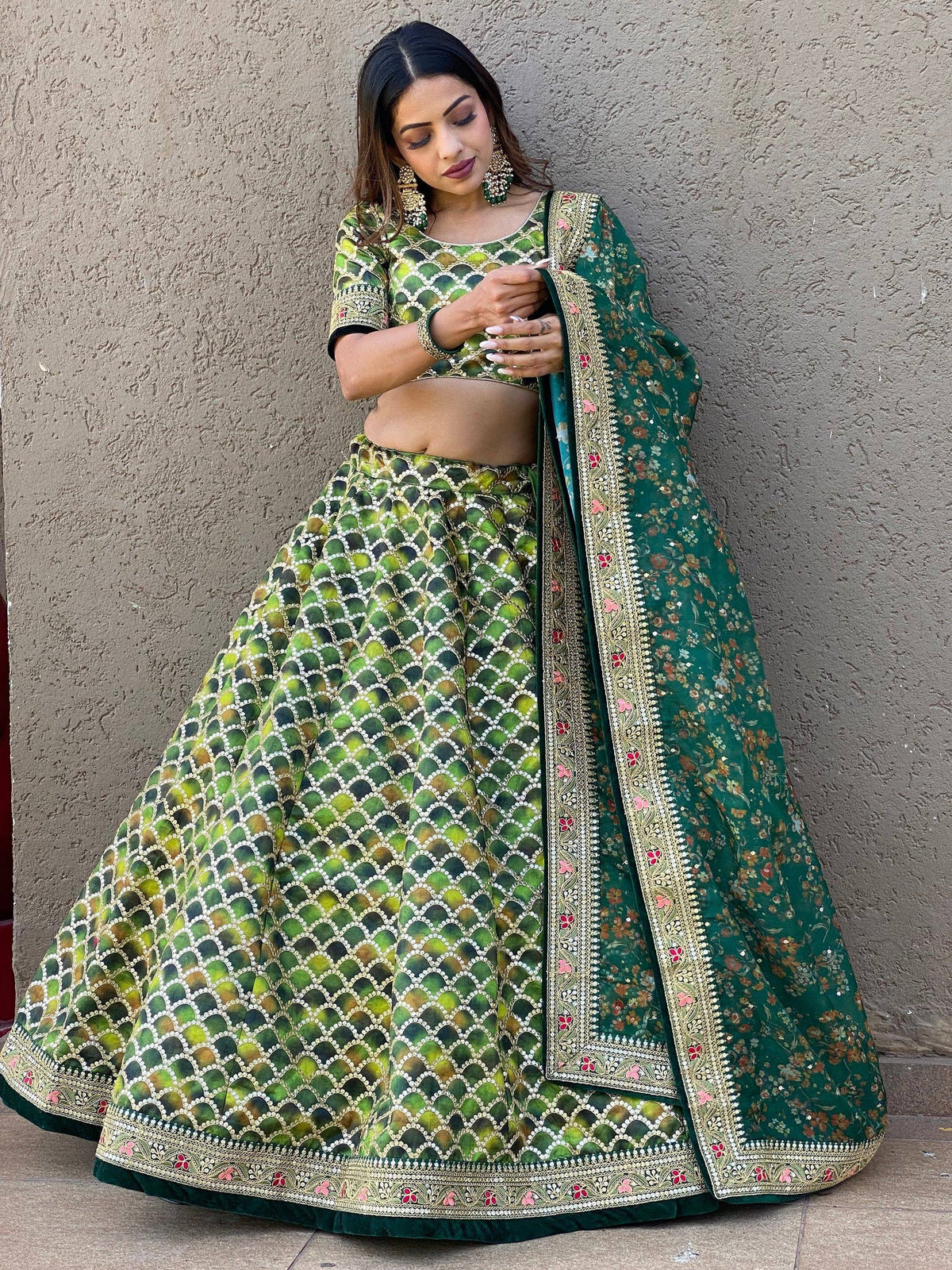 Green printed lehenga choli with floral dupatta, ethnic Indian wear for weddings and parties