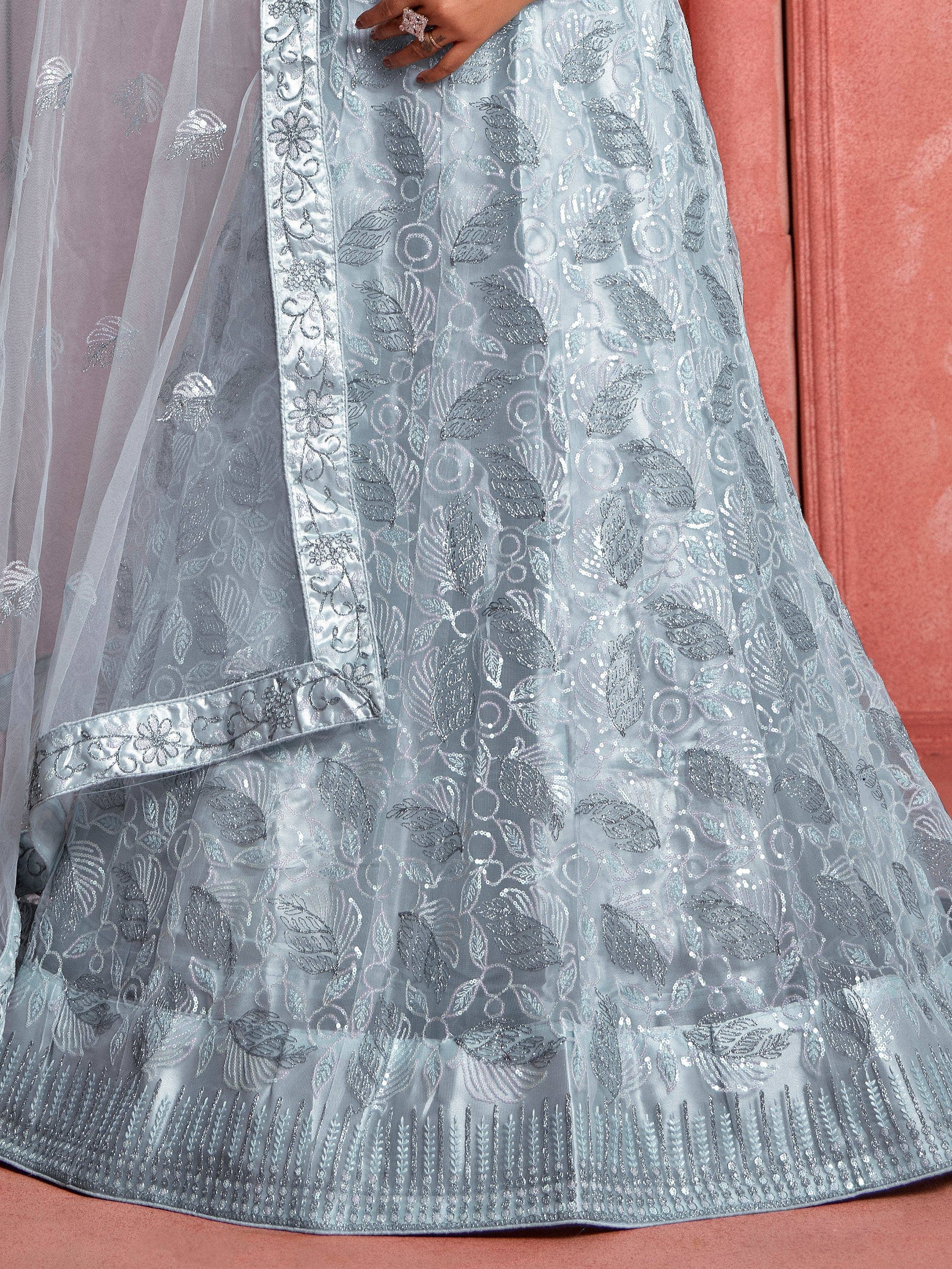 Light blue embroidered lehenga with sequin leaf patterns and floral border, perfect for Indian ethnic wear.