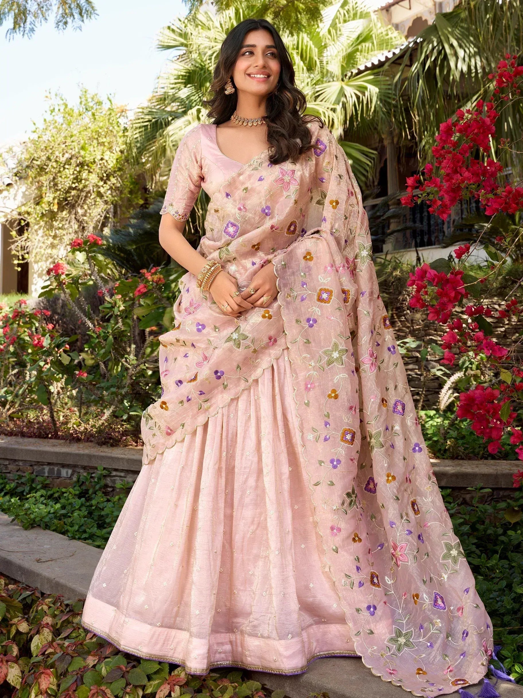 Pink floral embroidered lehenga choli with sheer dupatta, perfect for Indian ethnic wear occasions
