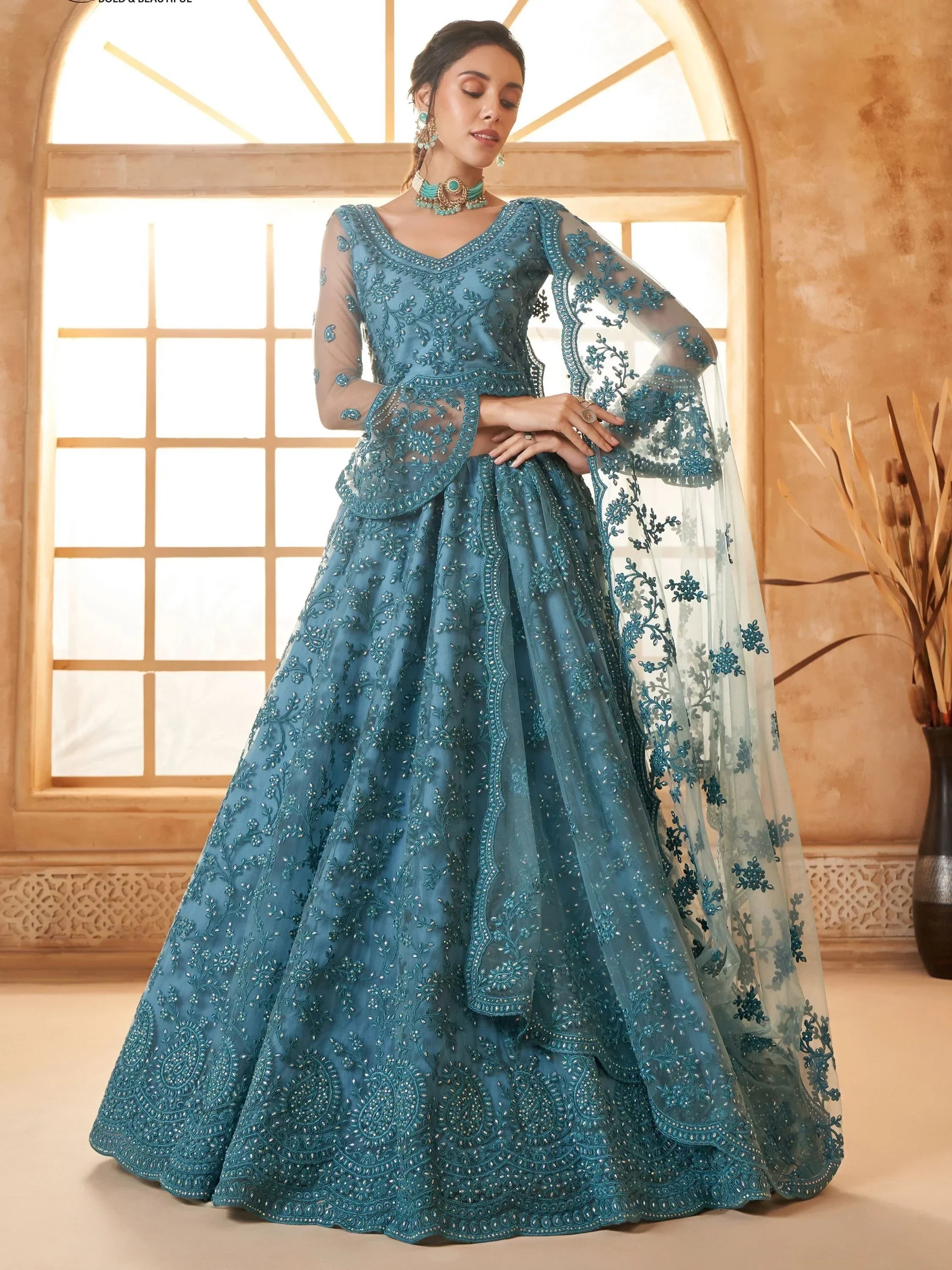 Teal blue embroidered lehenga choli with sheer sleeves and dupatta, Indian ethnic wear for weddings