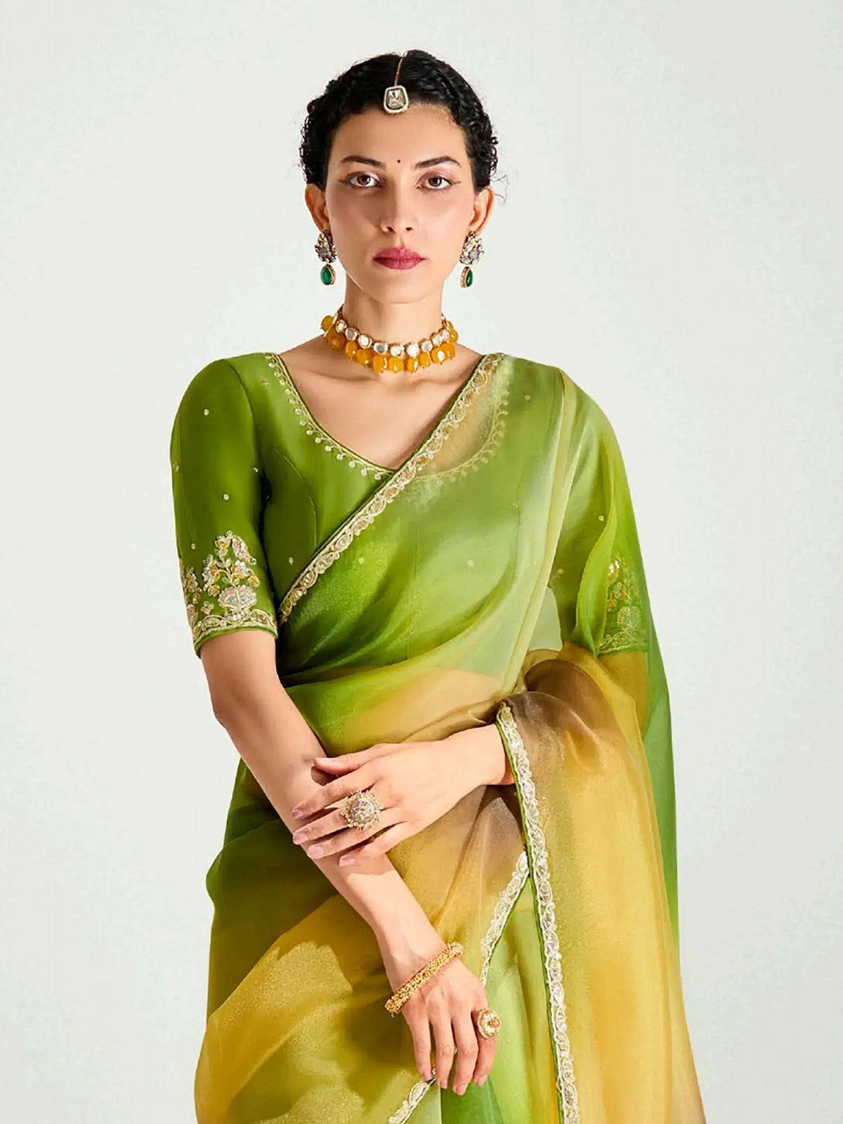 Green and gold designer saree with embroidered blouse, perfect for Indian ethnic wear occasions