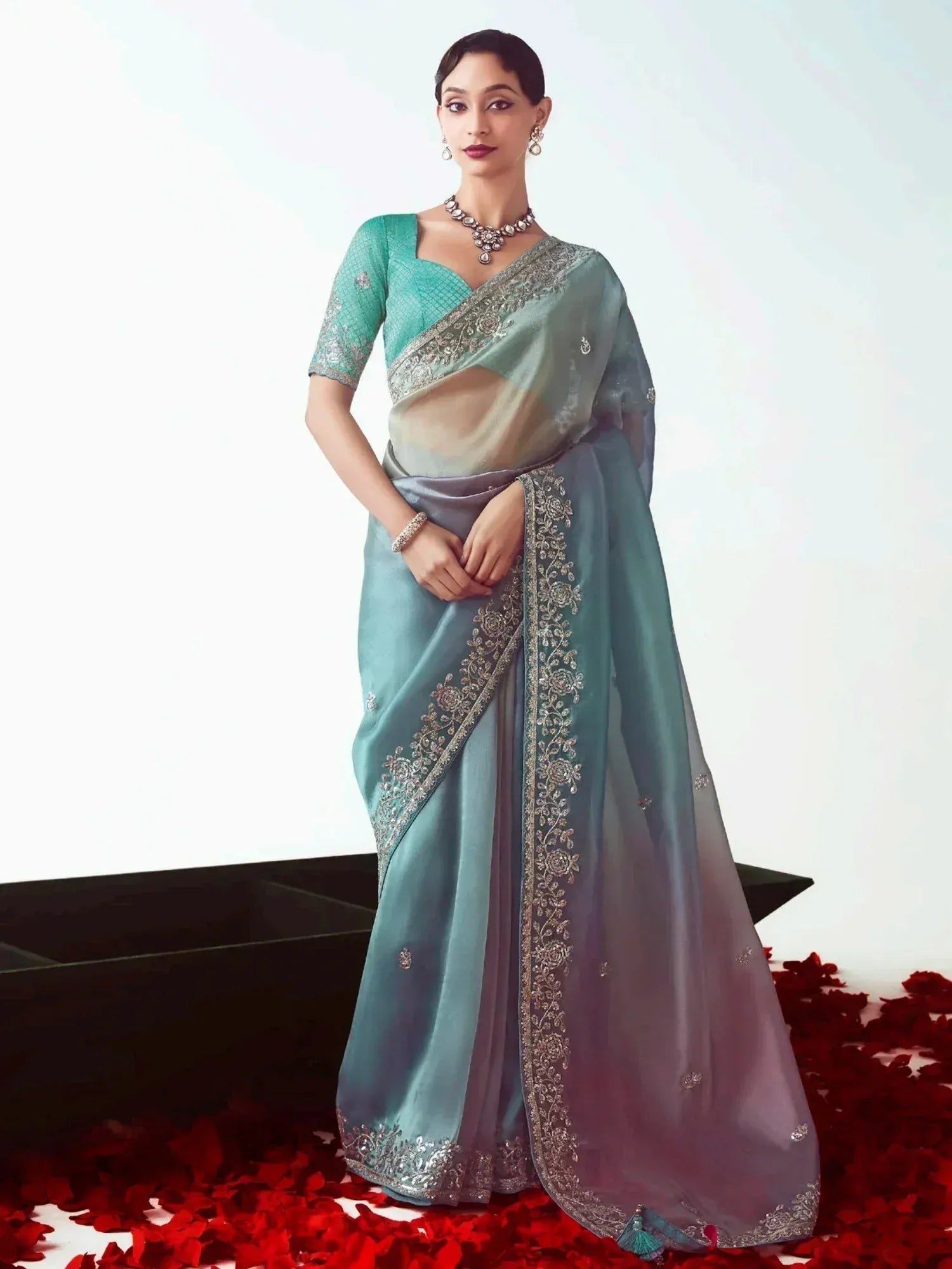 Elegant teal and grey embroidered saree with designer blouse, perfect for Indian ethnic occasions