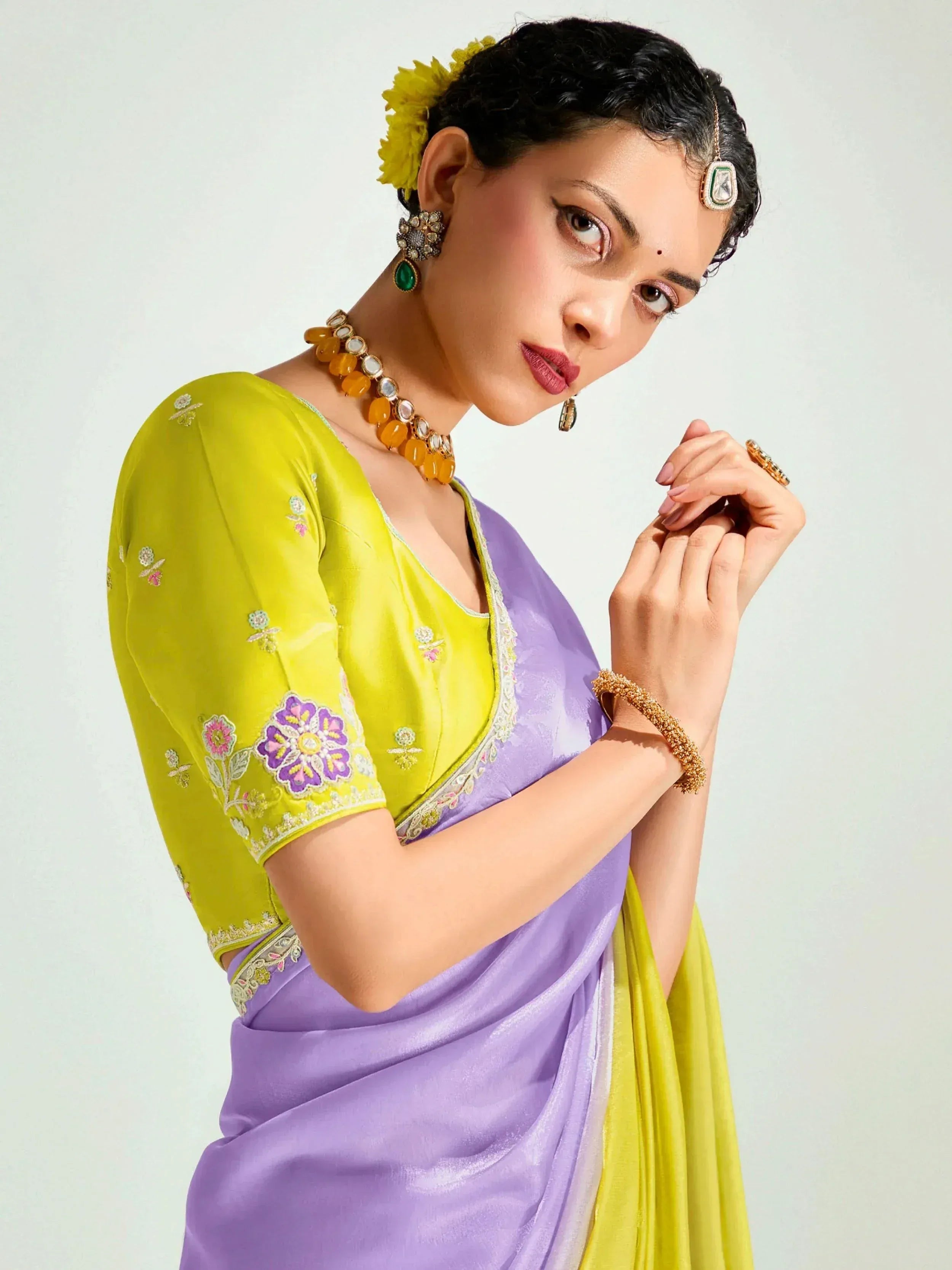 Purple and yellow embroidered saree with floral blouse, traditional Indian ethnic wear