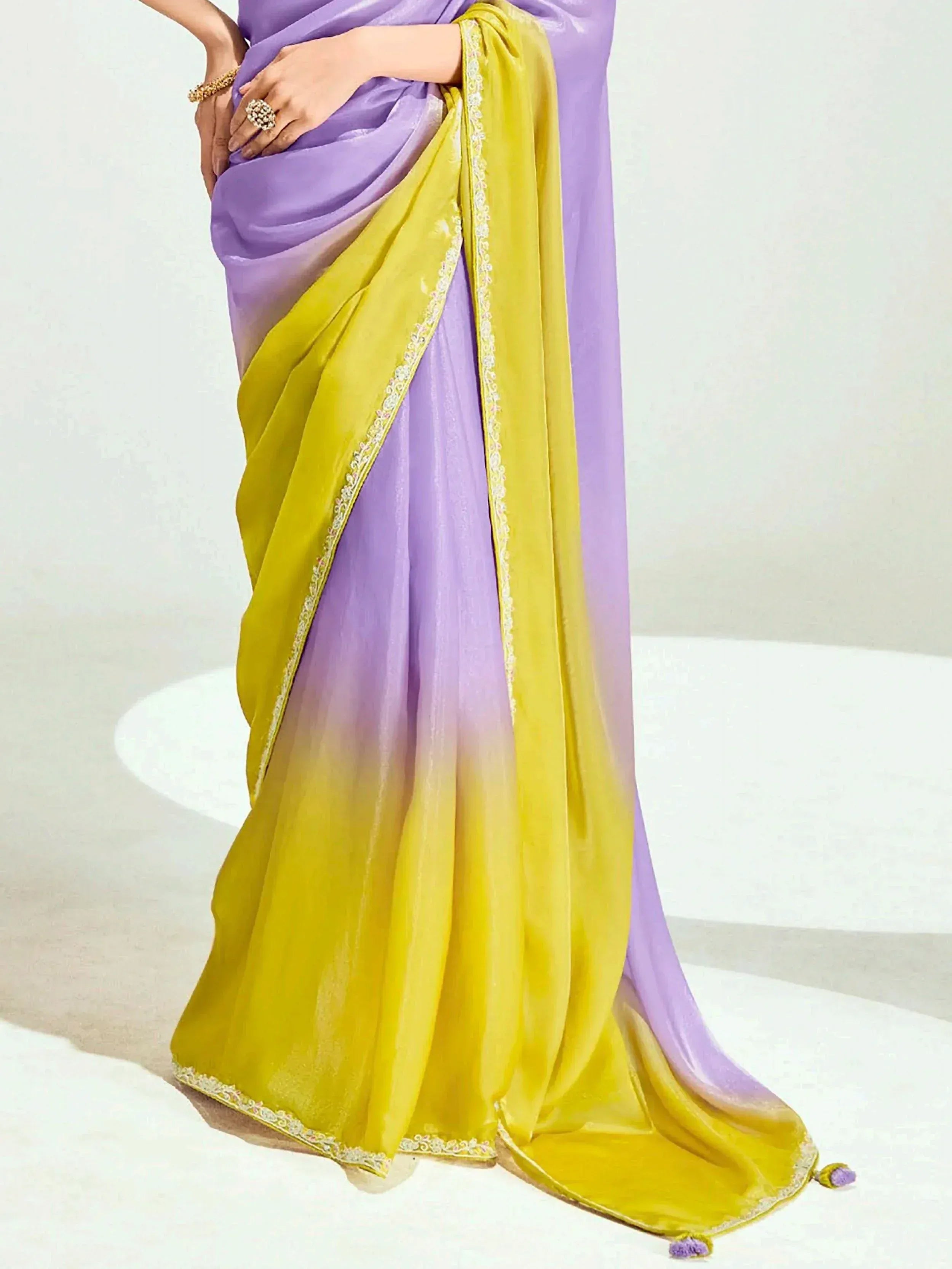 Purple and yellow ombre saree with lace detailing, perfect for ethnic wear