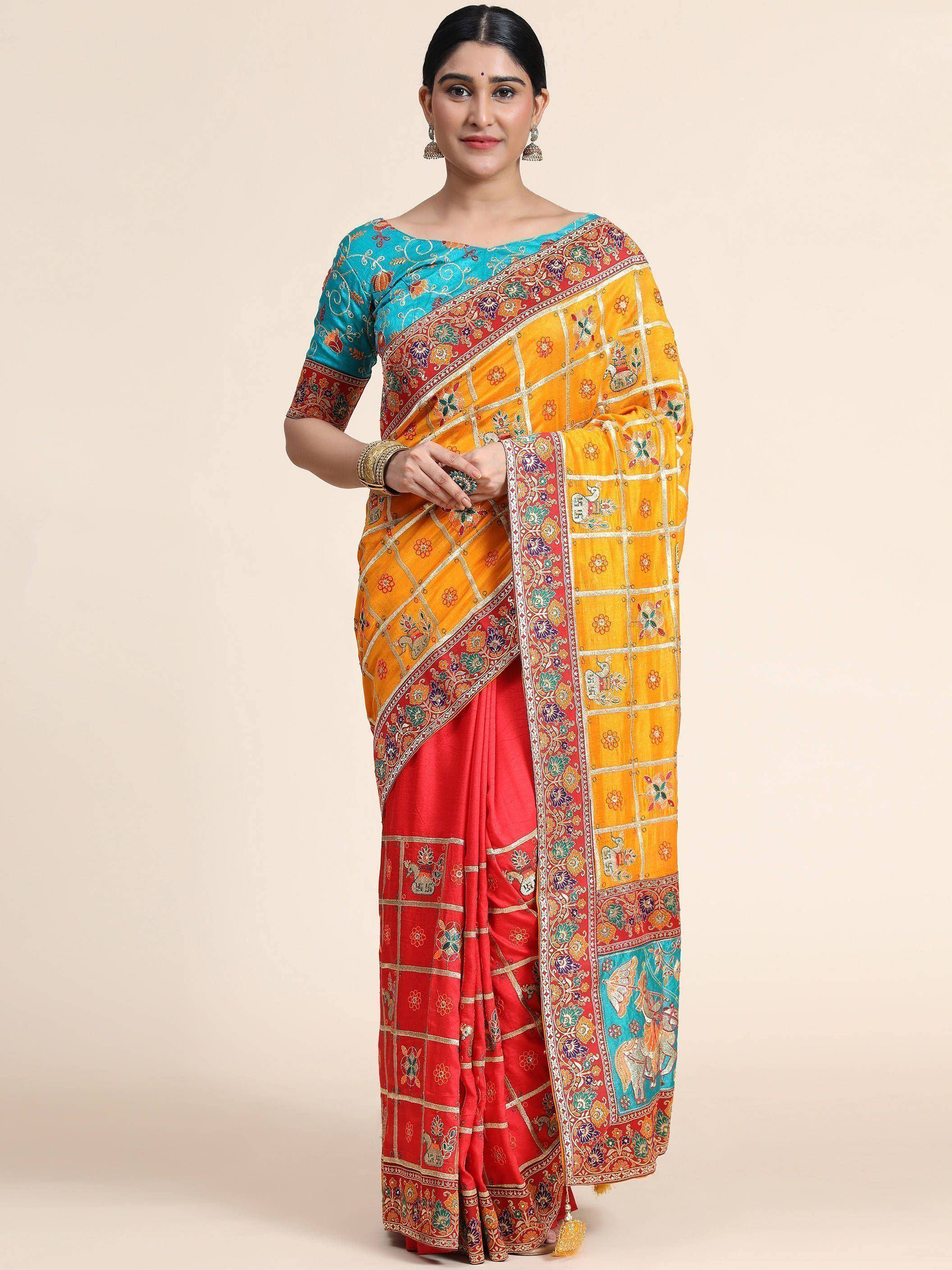 Yellow and red embroidered saree with blue blouse, featuring floral and elephant motifs, perfect for Indian ethnic wear.