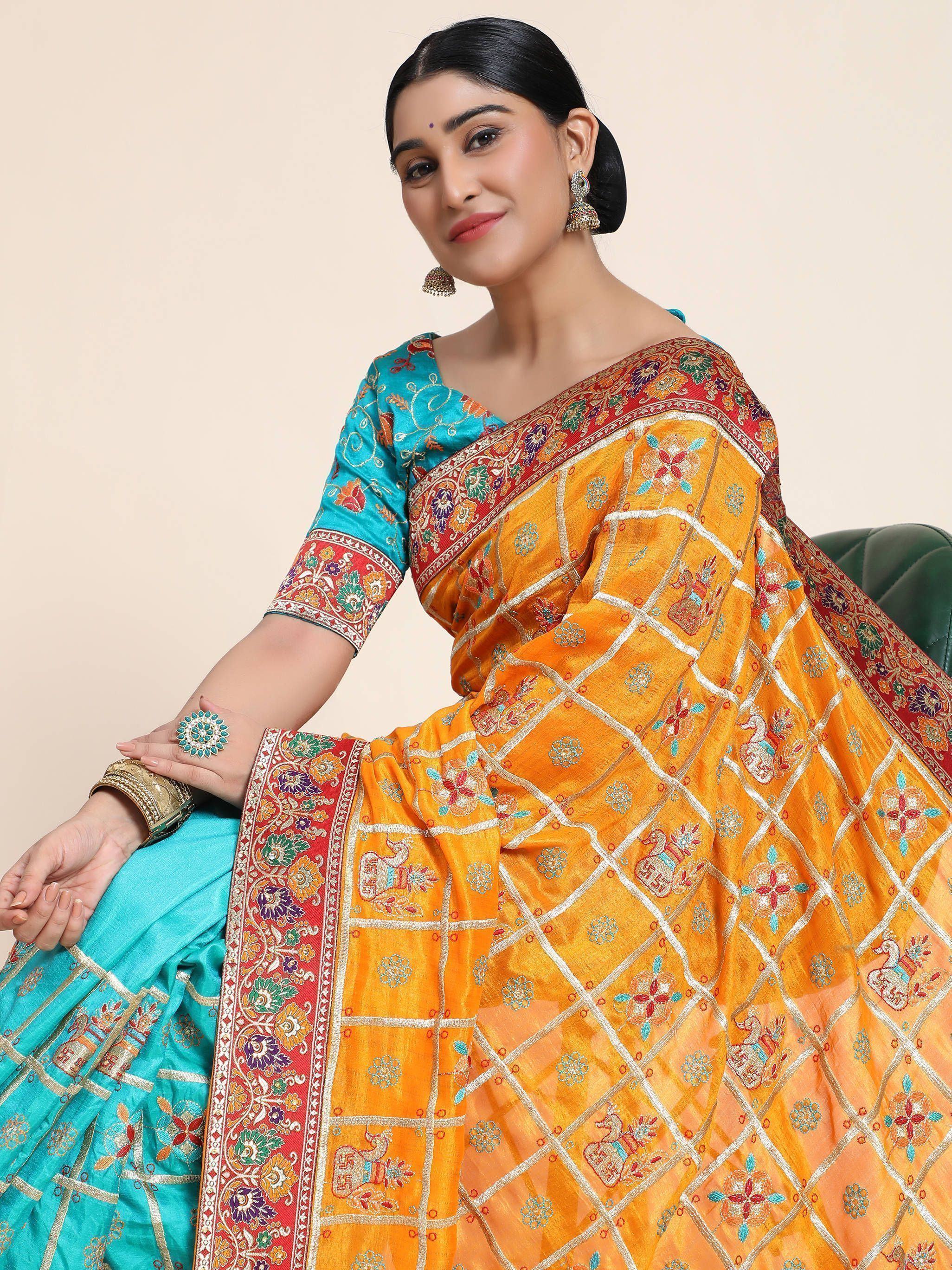 Yellow & Blue Embroidery Cadbury Silk Bridal Wear Panetar Saree
