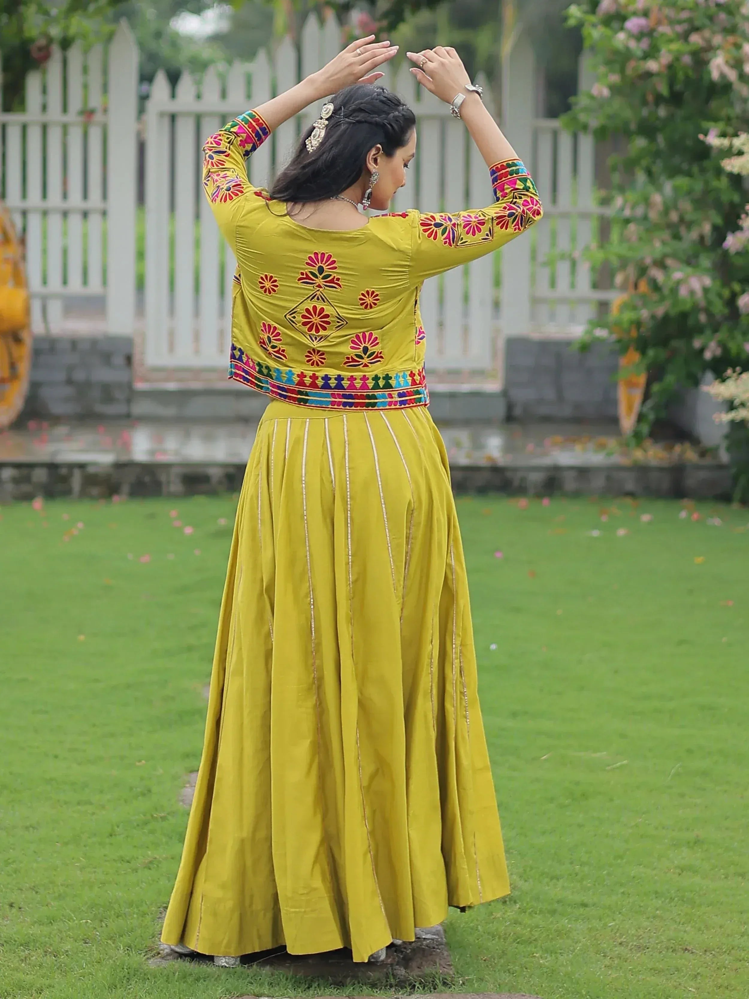 Yellow embroidered ethnic anarkali suit with floral patterns, perfect for Indian festivals and occasions
