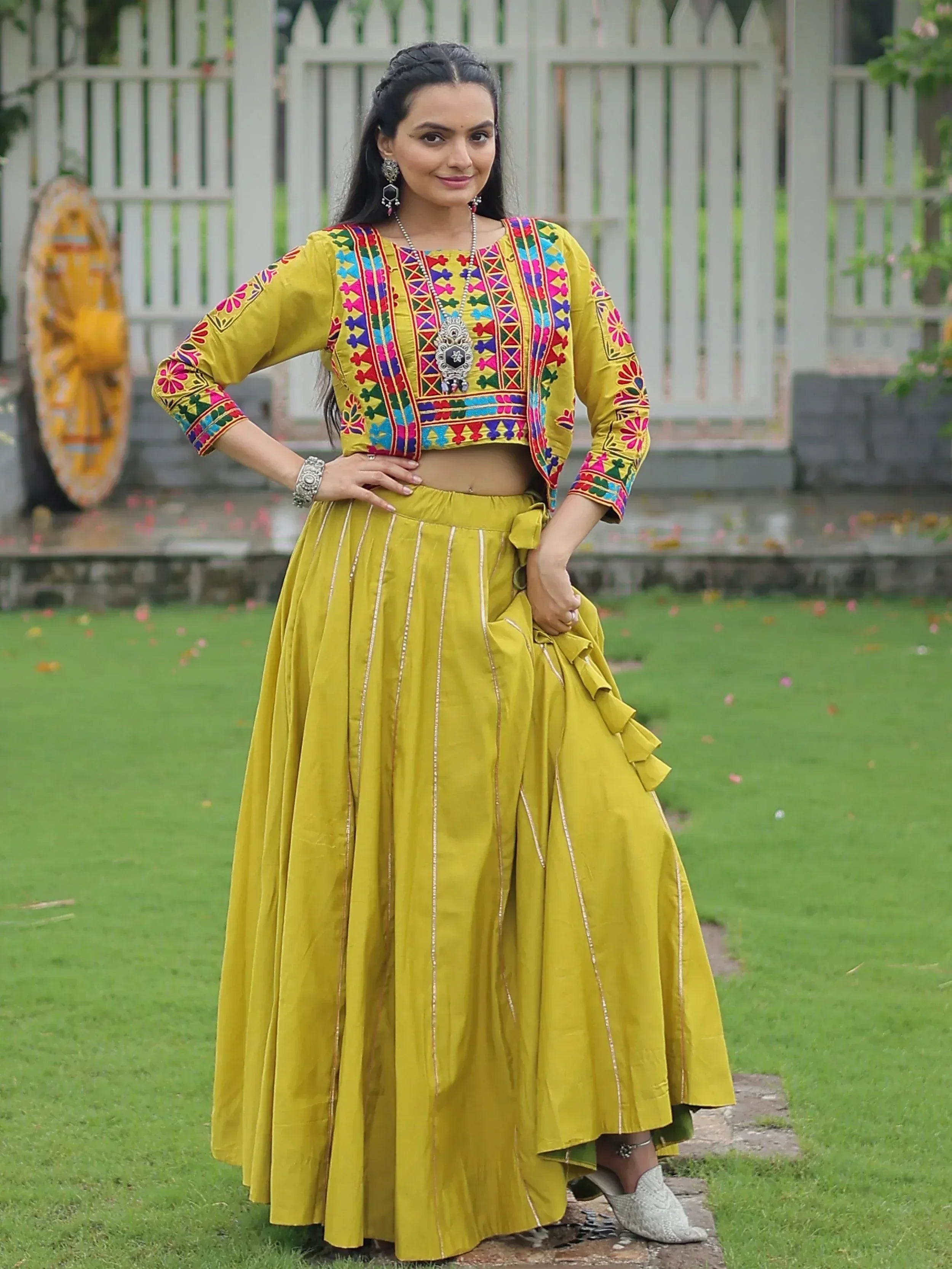 Yellow embroidered ethnic crop top with matching skirt, perfect for Indian festive occasions