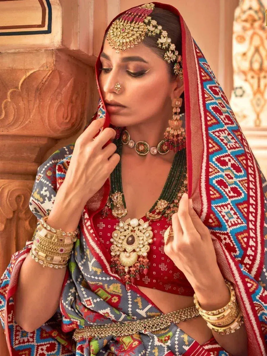Indian ethnic wear with embroidered lehenga, dupatta, and traditional jewelry for festive occasions