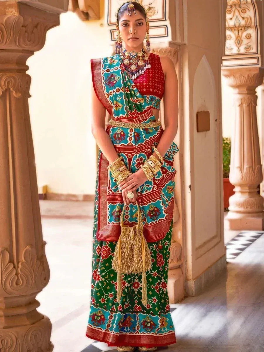 Woman in vibrant Indian ethnic lehenga choli with intricate patterns, traditional jewelry, and ornate palace backdrop