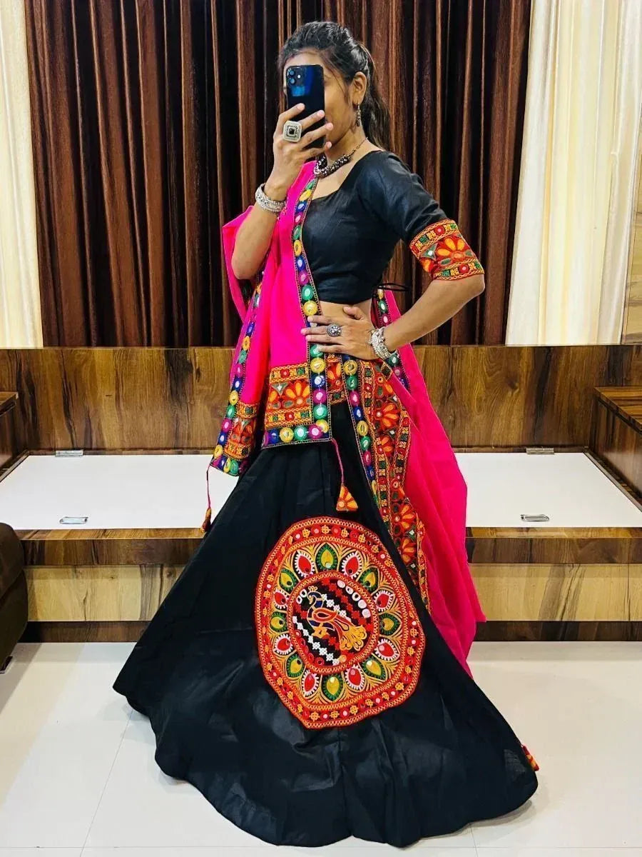 Black and pink embroidered lehenga choli with mirror work, perfect for Indian ethnic occasions