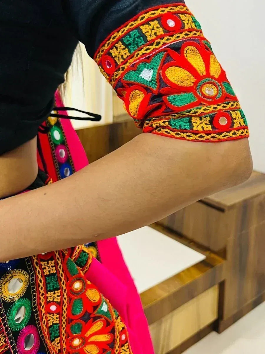 Vibrant Indian ethnic wear with mirror work and floral embroidery on sleeve