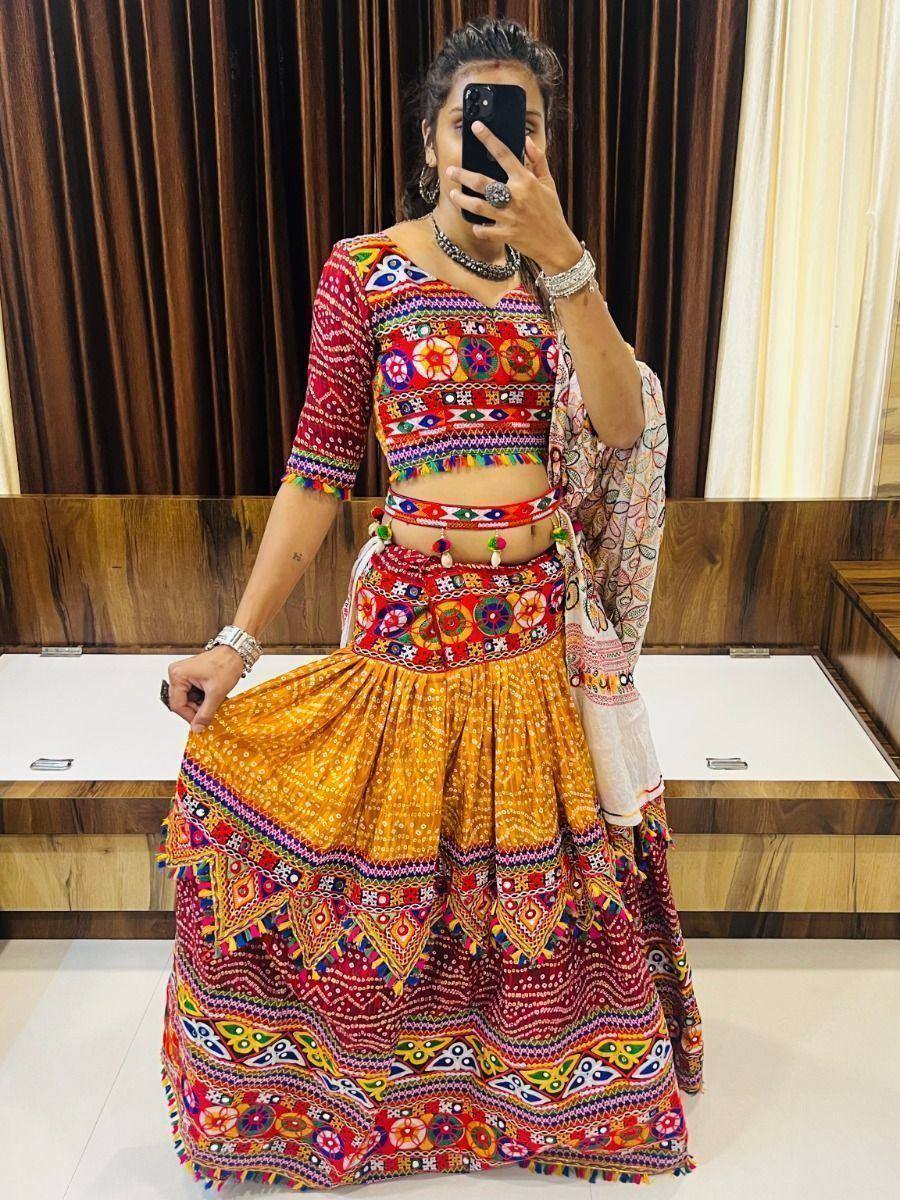 Vibrant Indian ethnic lehenga choli with mirror work, perfect for festive occasions and traditional celebrations.