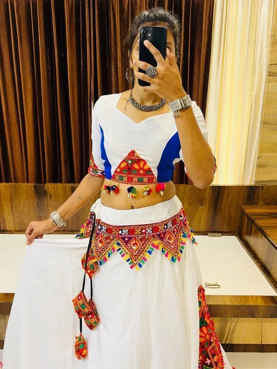 White and blue ethnic crop top with colorful mirror work and embroidered skirt, perfect for Indian festive wear