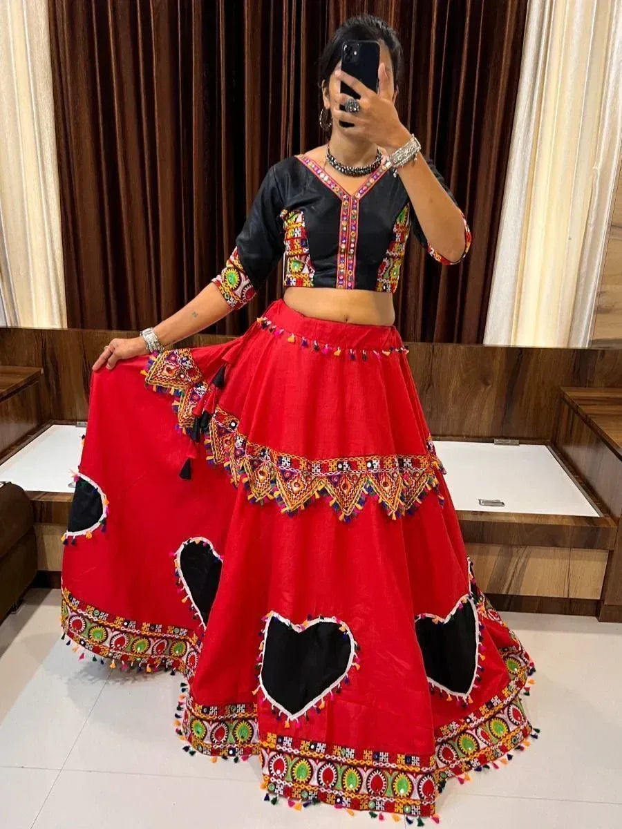 Red and black embroidered lehenga choli with heart cutouts, mirror selfie, ethnic wear