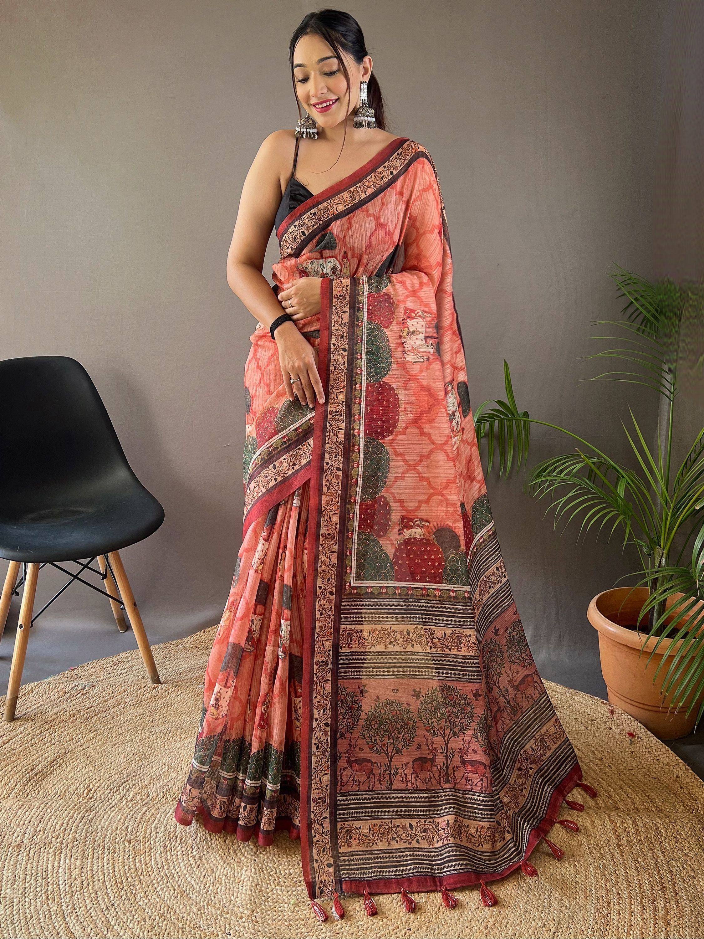 Woman in printed ethnic saree with deer and floral motifs, perfect for Indian occasions
