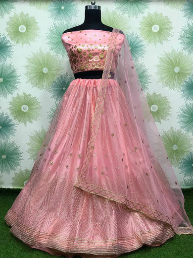 Fabulous Peach Net Embroidered Function Wear Lehenga Choli