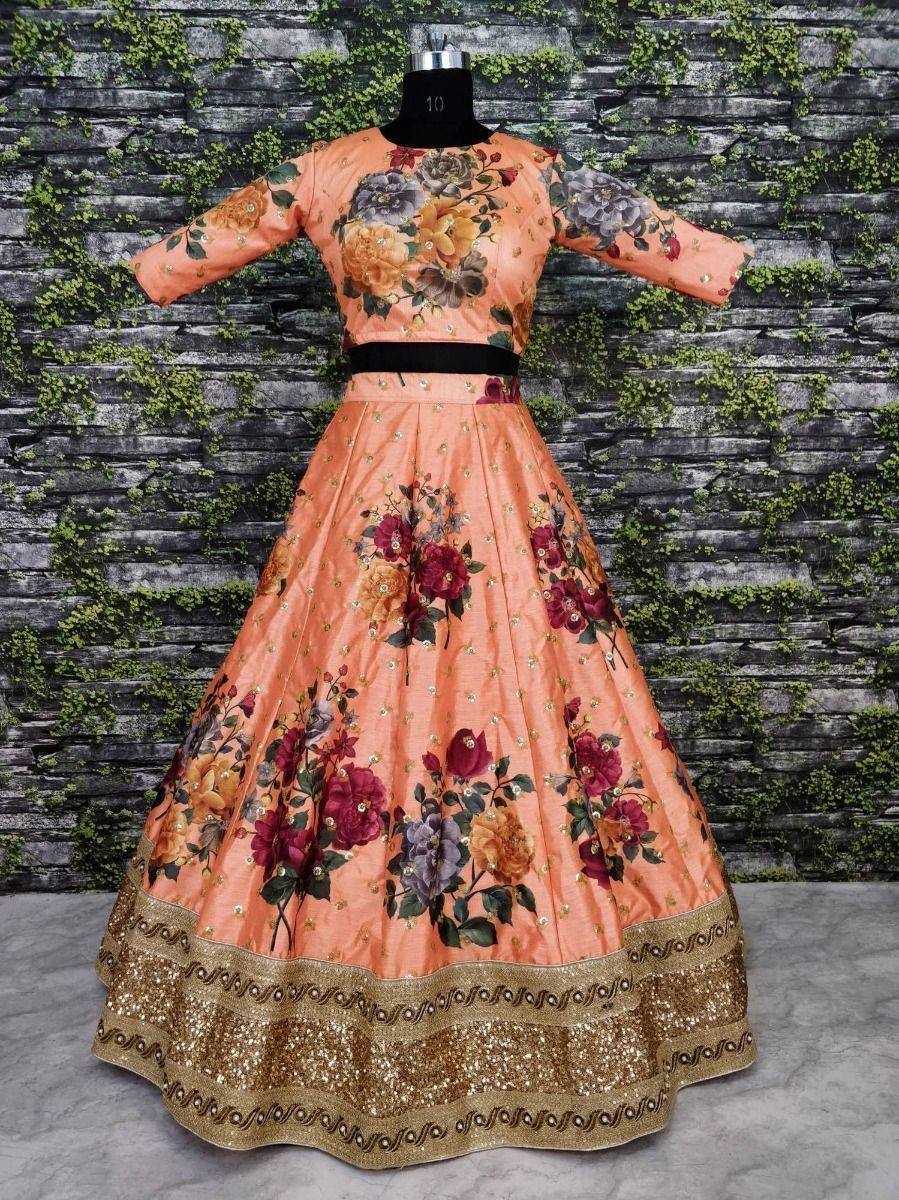 Peach floral lehenga choli with gold border, perfect for Indian ethnic wear occasions