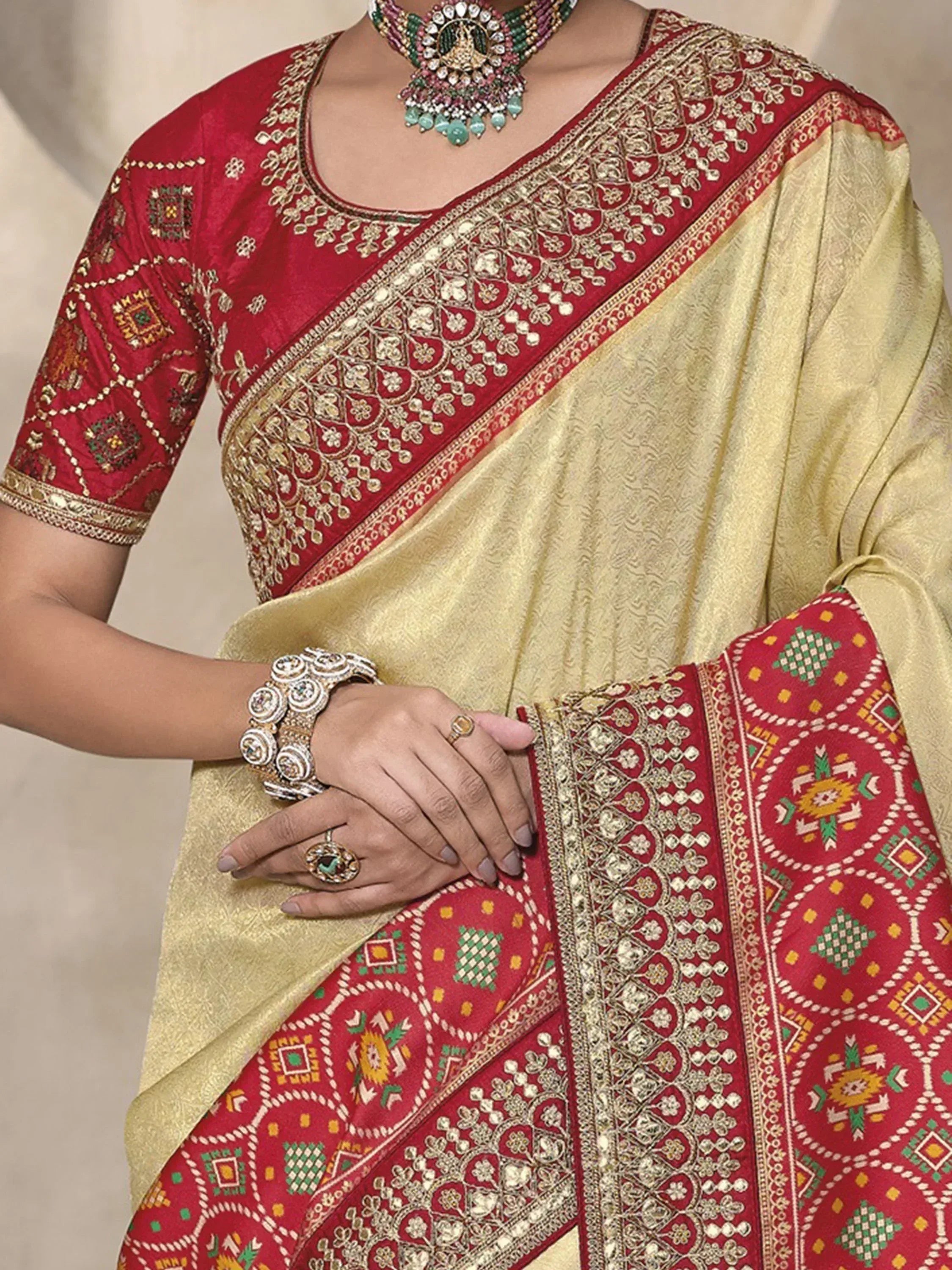 Red and gold embroidered saree with matching blouse, traditional Indian ethnic wear