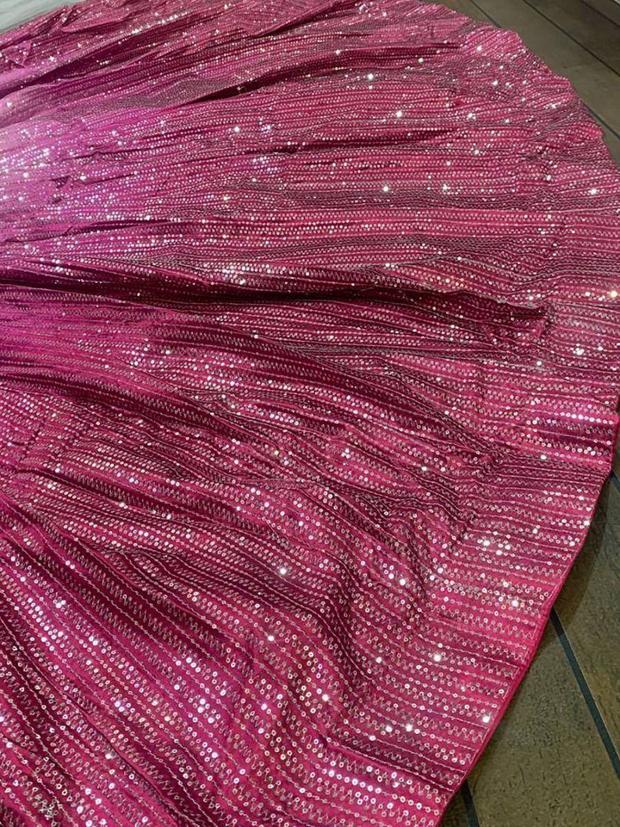 Pink sequined lehenga skirt with shimmering embellishments, perfect for Indian ethnic wear