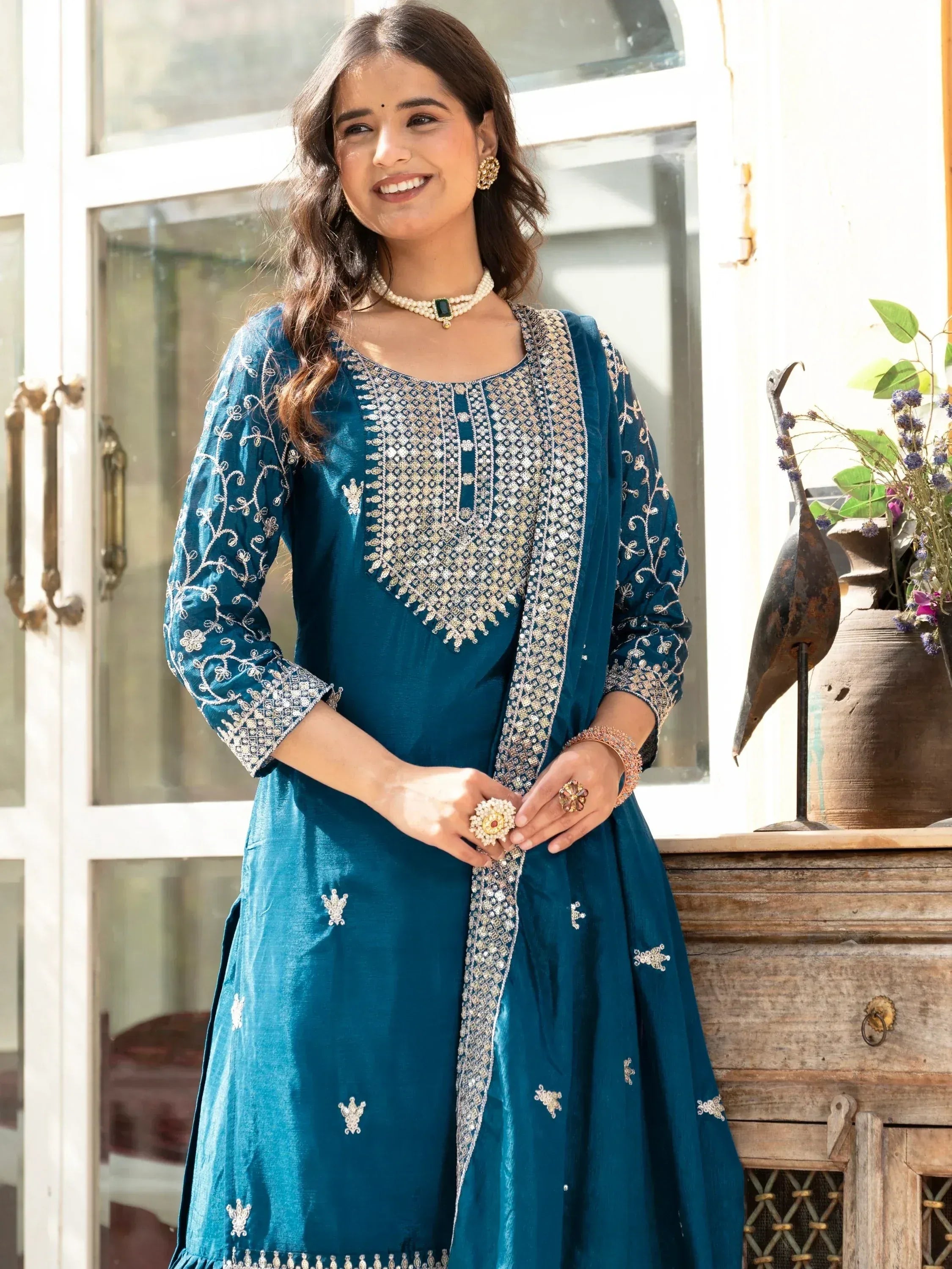 Teal embroidered ethnic kurti with gold detailing and matching dupatta for festive occasions