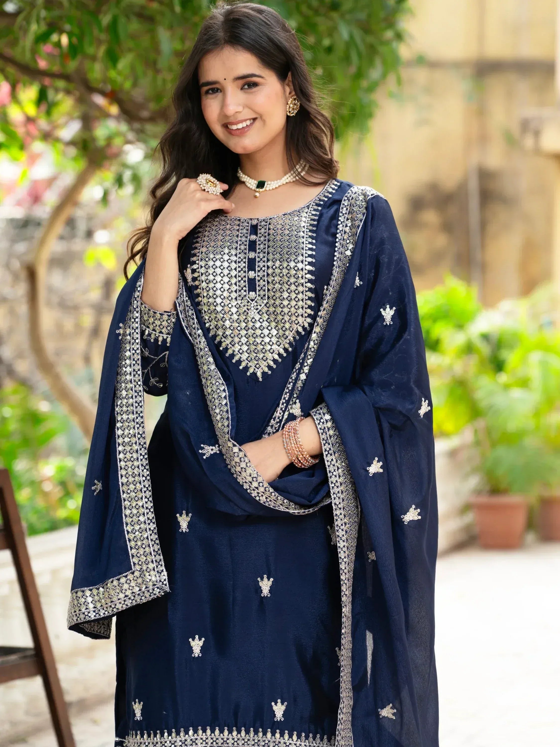 Navy blue embroidered salwar kameez with gold detailing, perfect for Indian ethnic wear occasions