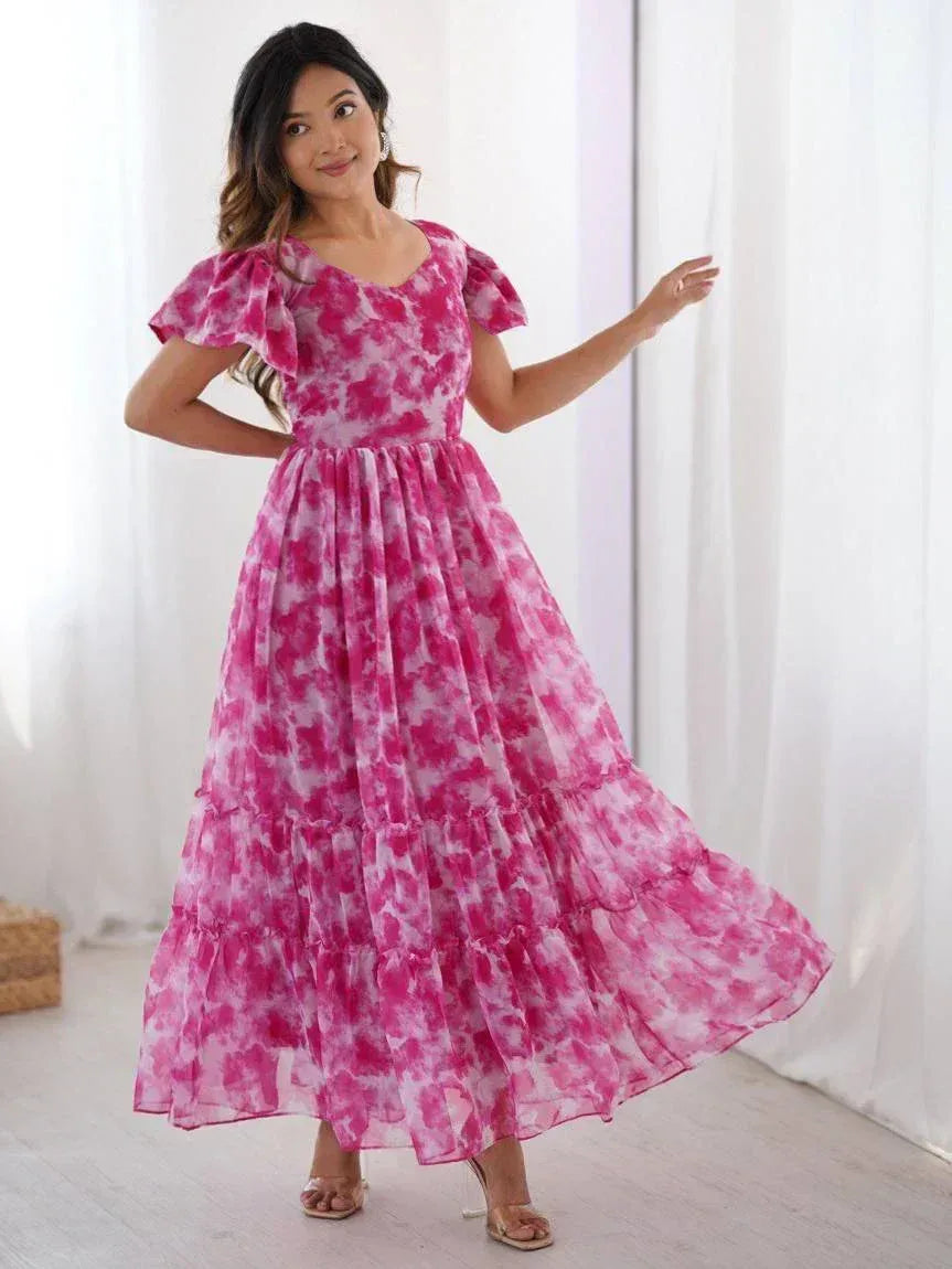 Pink floral tiered maxi dress with puff sleeves, perfect for ethnic occasions and parties