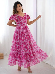 Woman wearing a pink and white tie-dye ethnic gown in a bright room, Ethnic Plus fashion