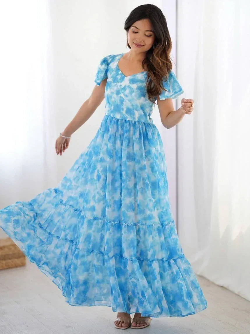 Blue tie-dye ethnic gown with ruffled layers, perfect for Indian festive occasions