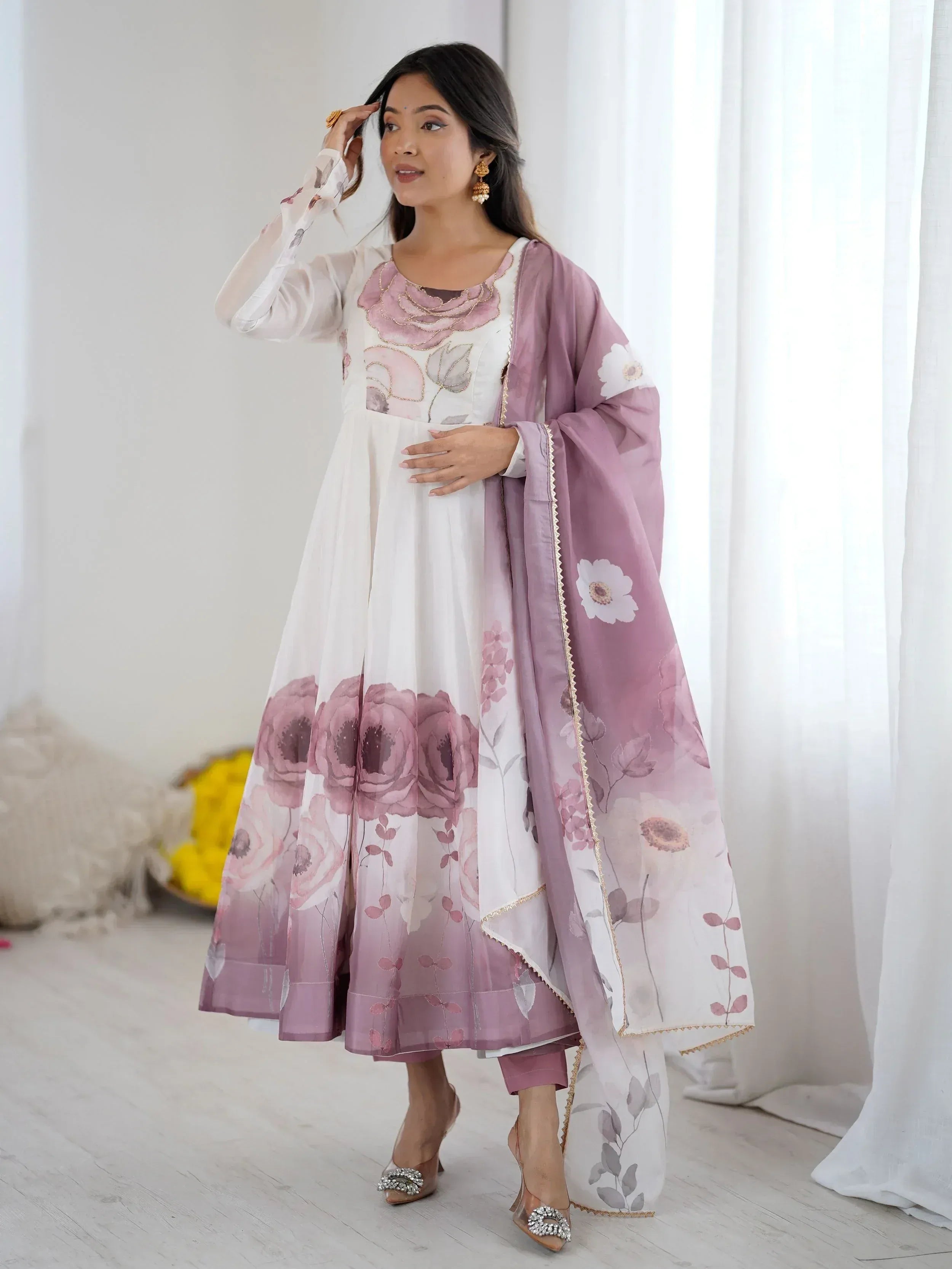 Elegant white and mauve floral print salwar kameez with matching dupatta, perfect for Indian ethnic occasions.