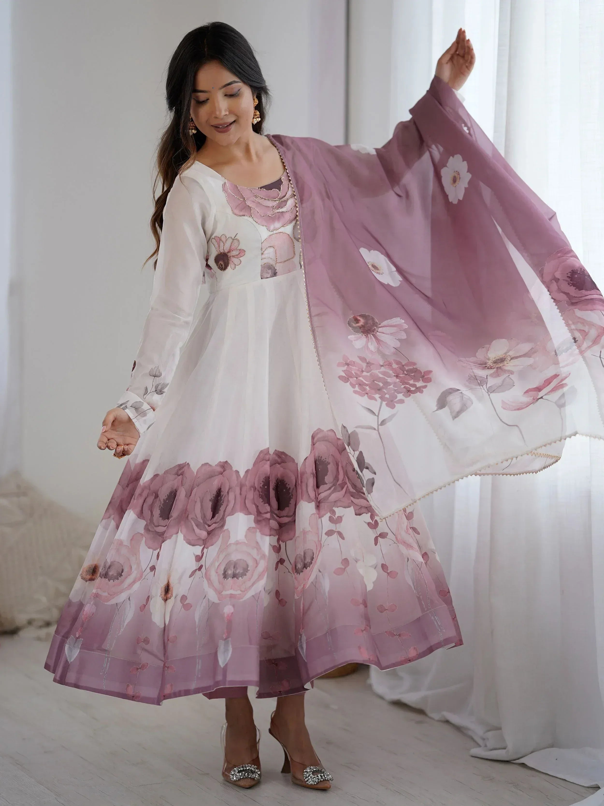 White and mauve floral print ethnic gown with matching dupatta, perfect for Indian occasions