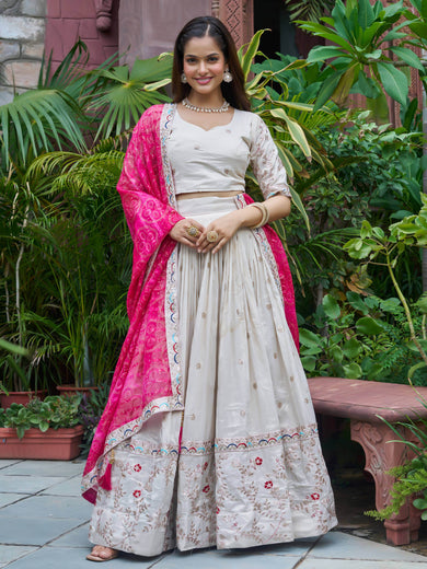 Amazing White Embroidered Silk Lehenga Choli With Pink Dupatta