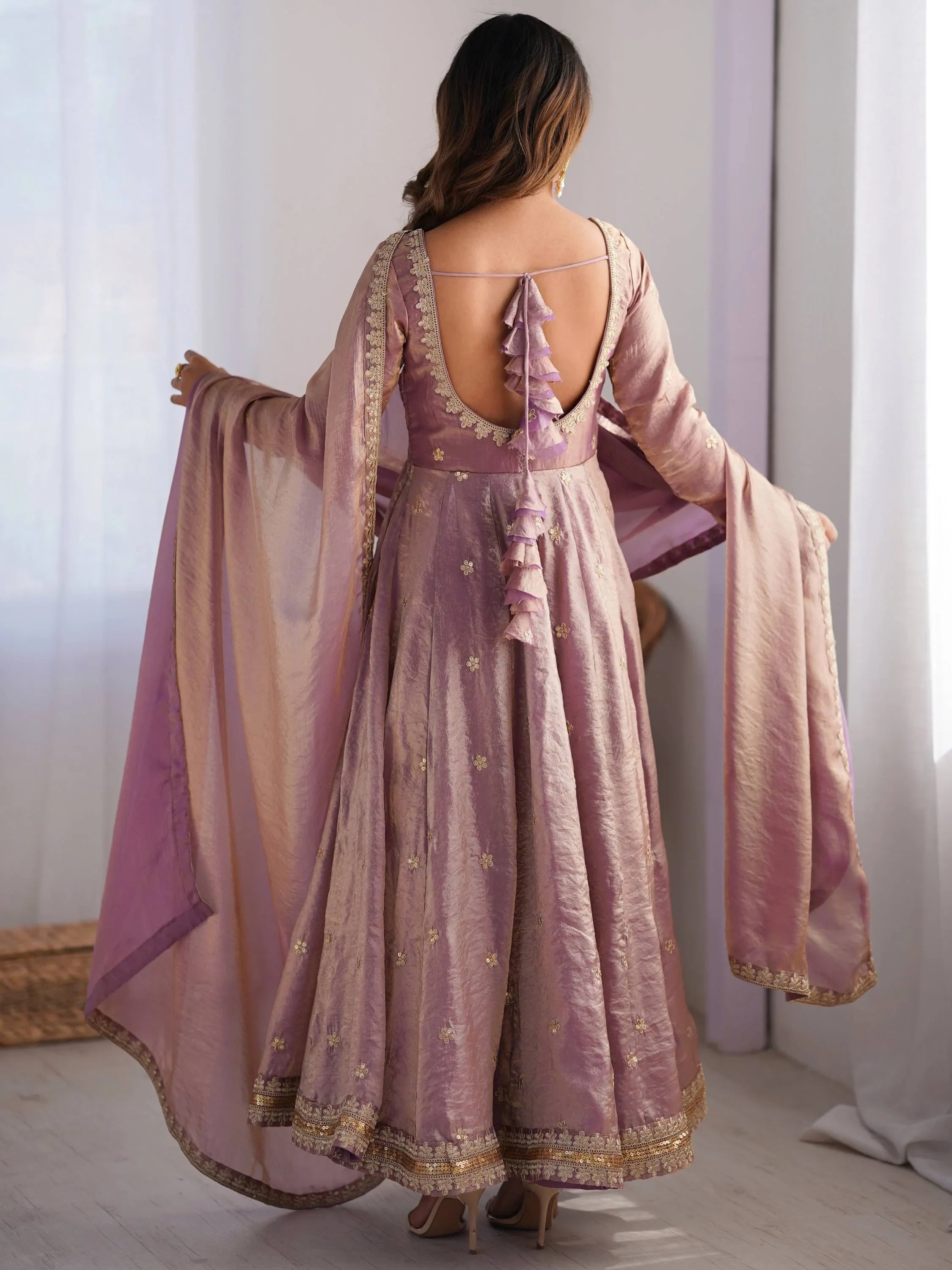 Pink designer anarkali with gold embroidery, ruffled back, and dupatta for Indian ethnic wear