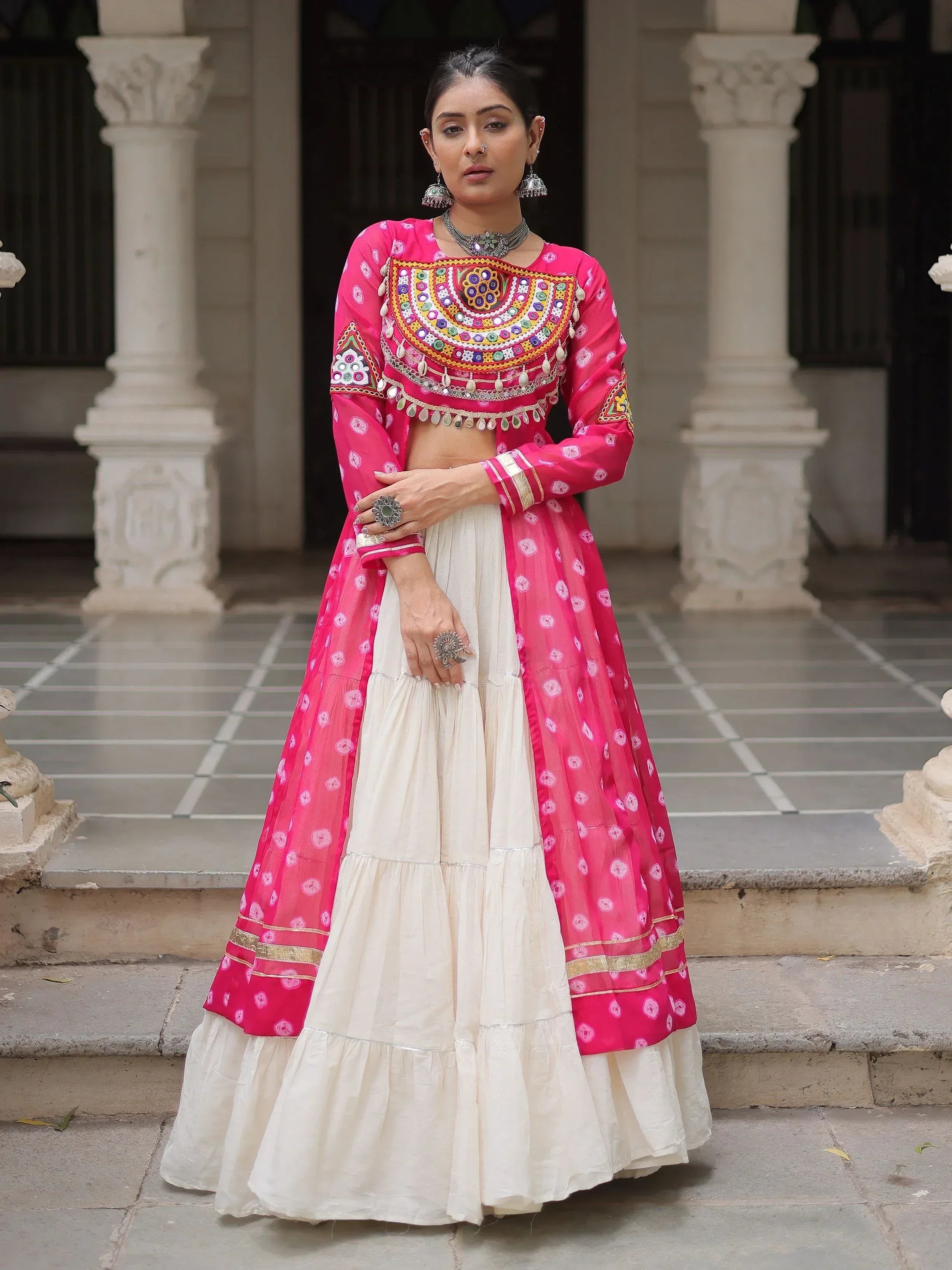 Pink and cream ethnic Anarkali with mirror work, perfect for Indian weddings or festive occasions
